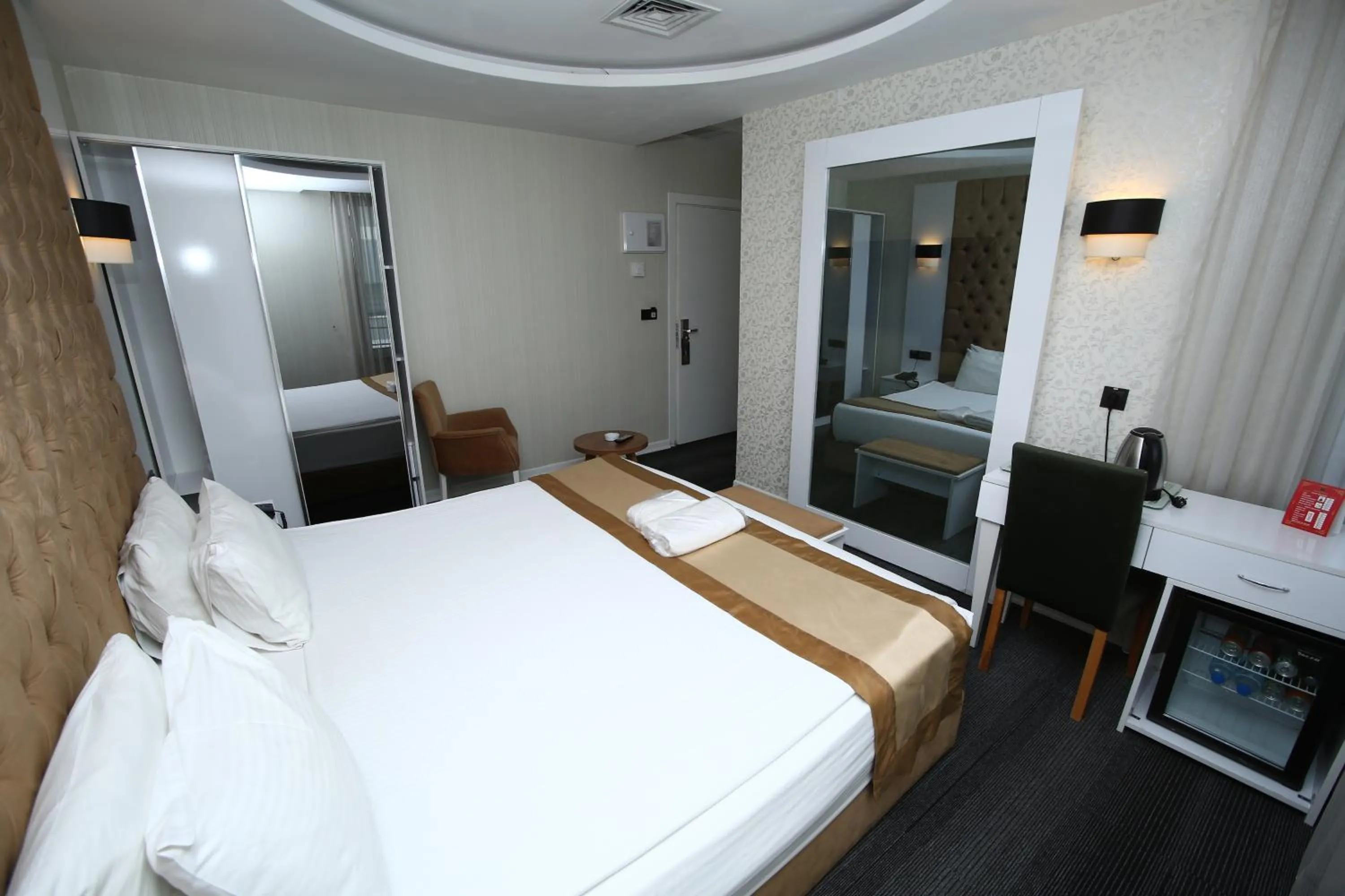 Bed in Grand Silay Hotel