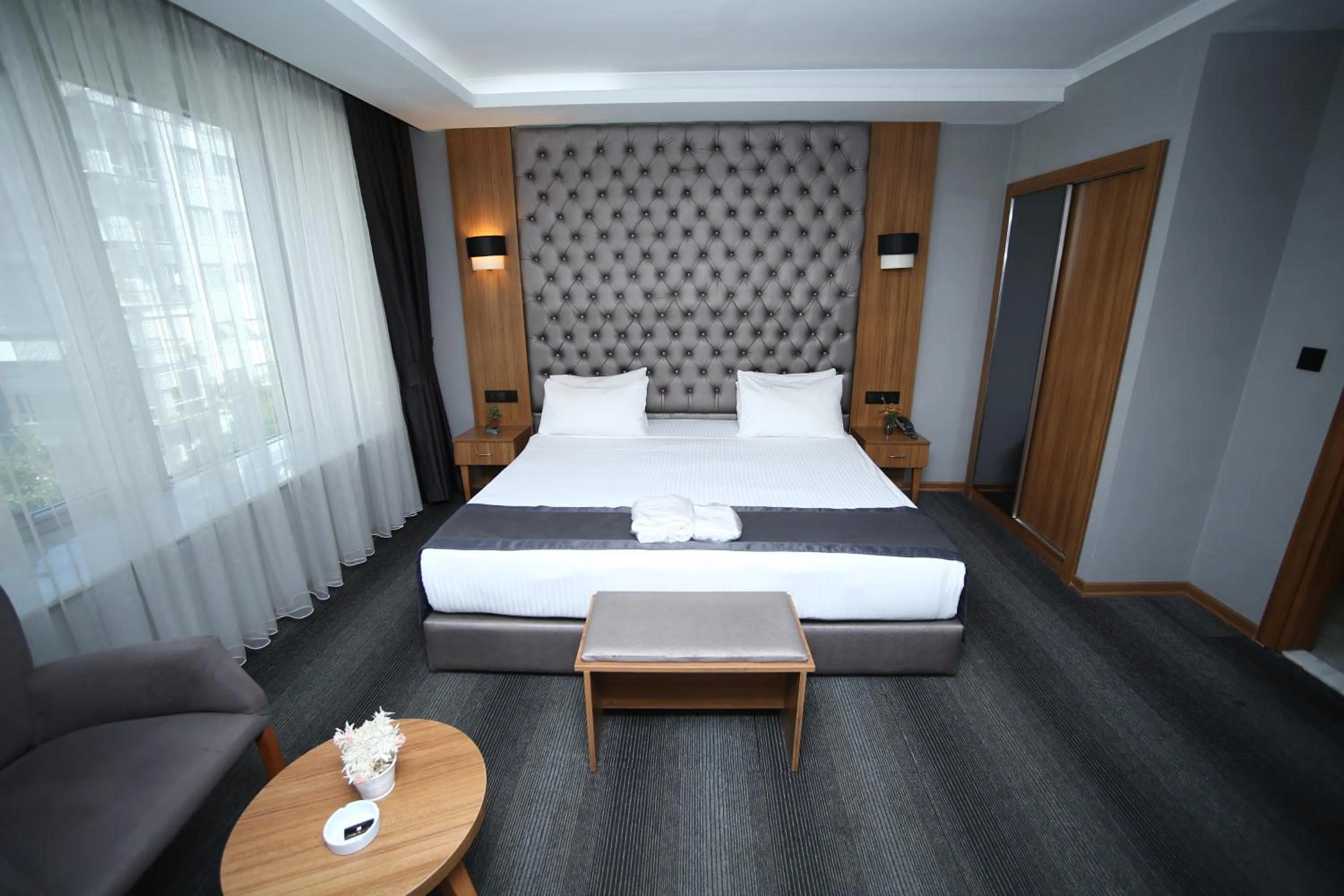 Bed in Grand Silay Hotel