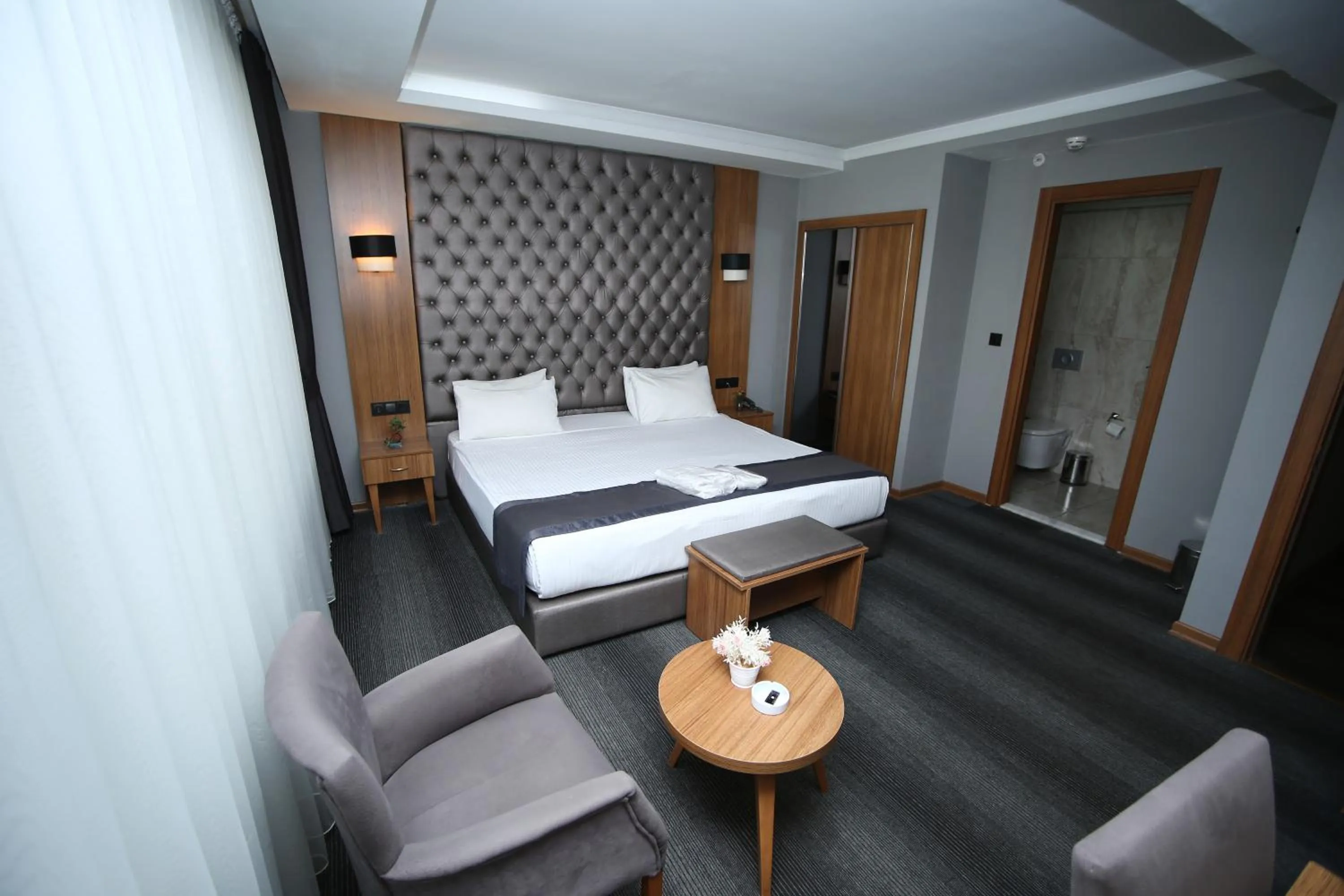 Bed in Grand Silay Hotel