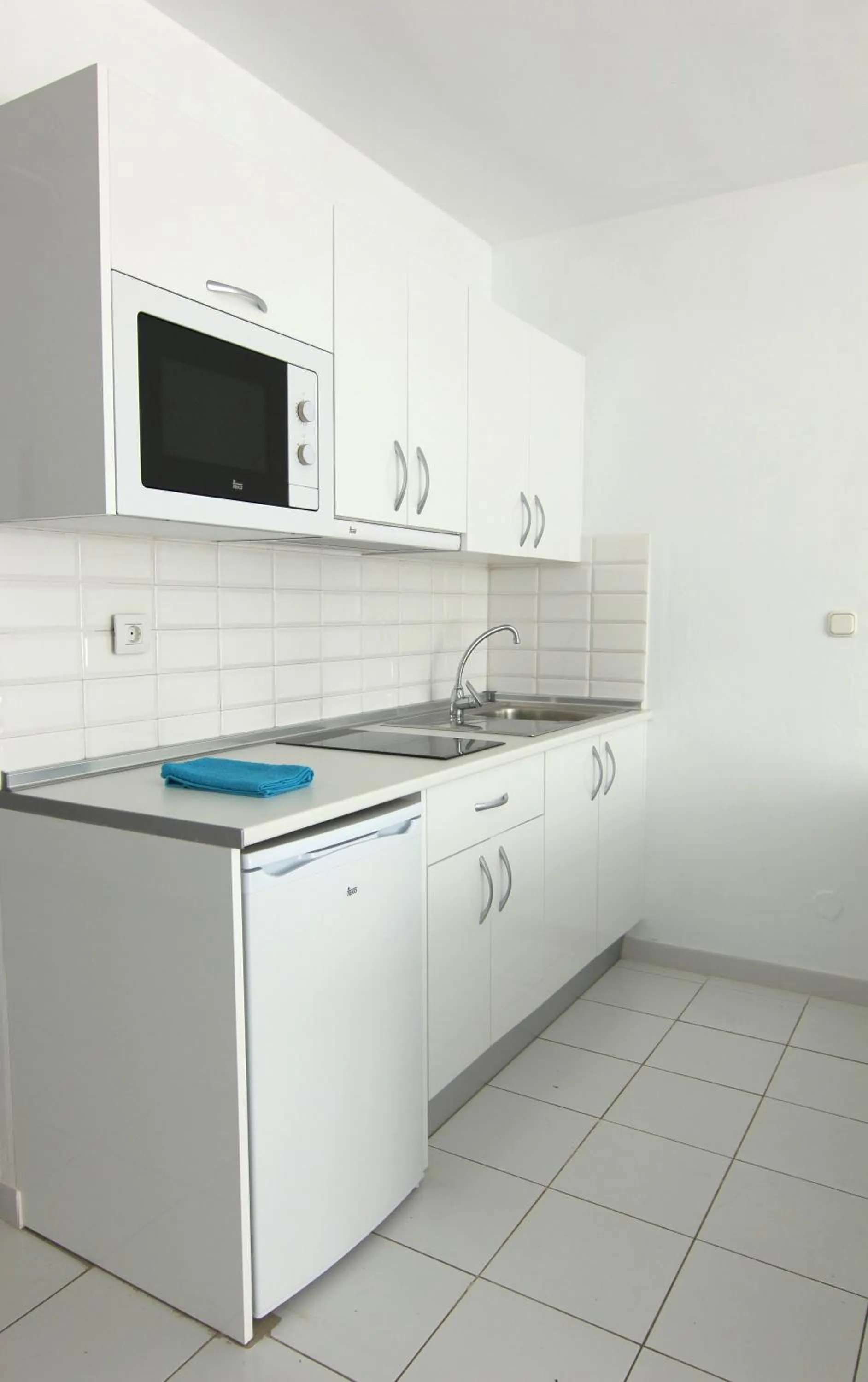 Kitchen or kitchenette in Apartamentos Orly Club Arena Dorada