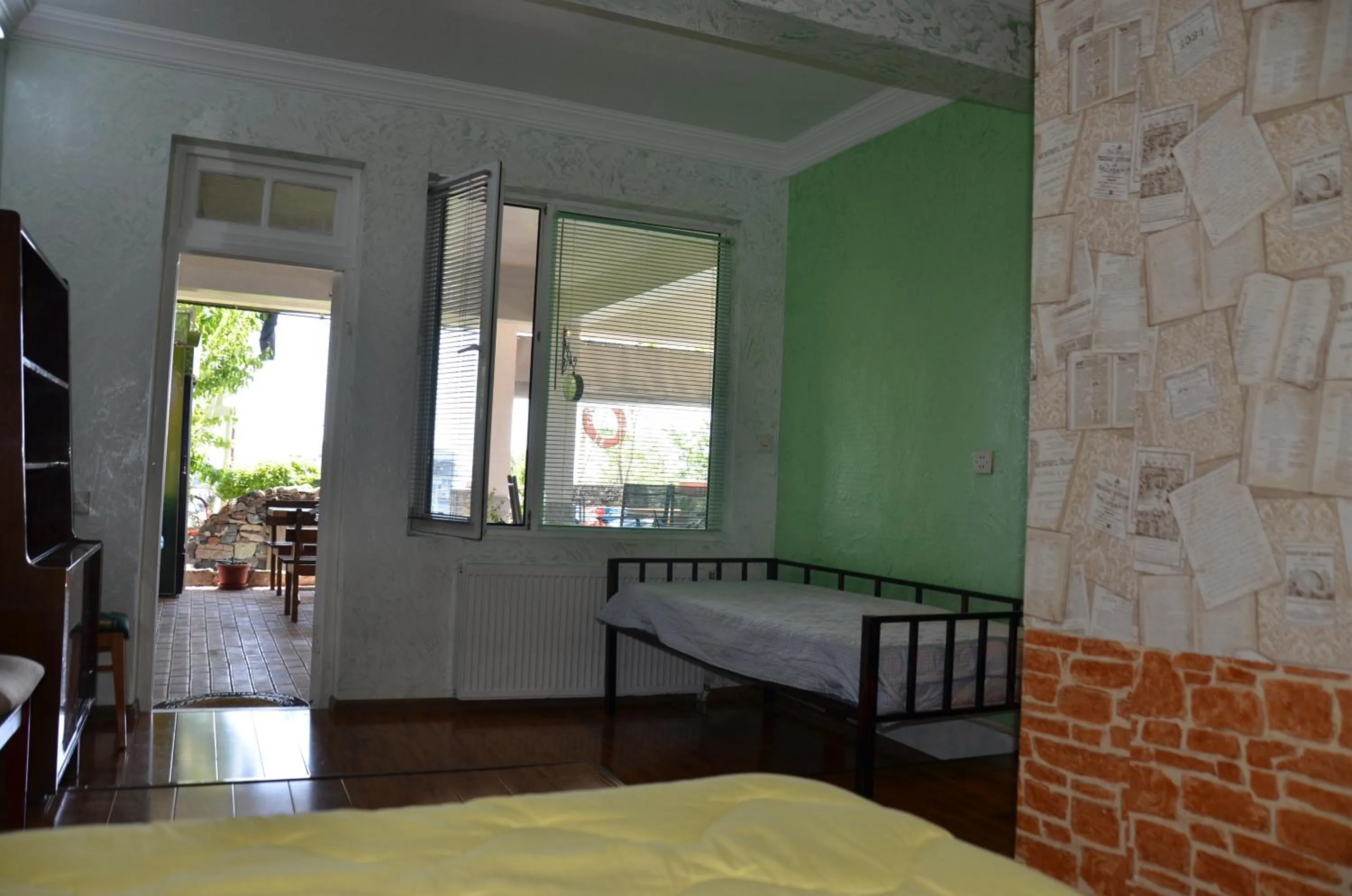 Photo of the whole room, Bed in TJ Guest House
