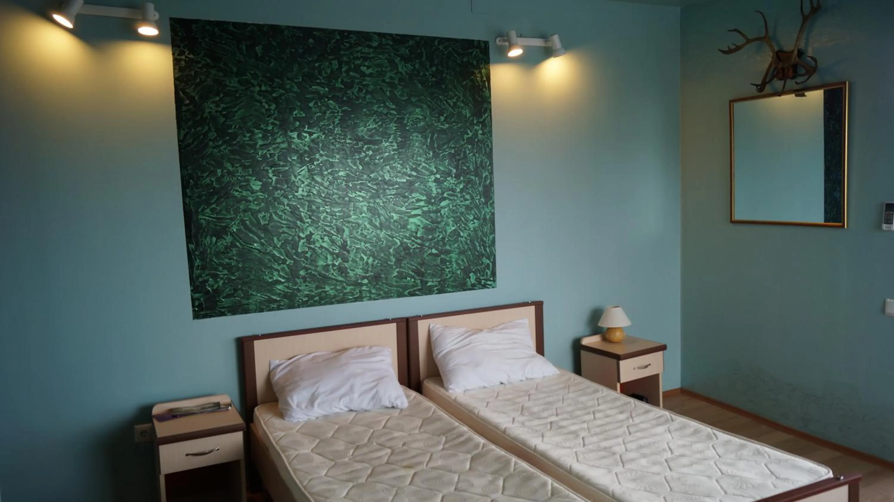 Photo of the whole room, Bed in TJ Guest House