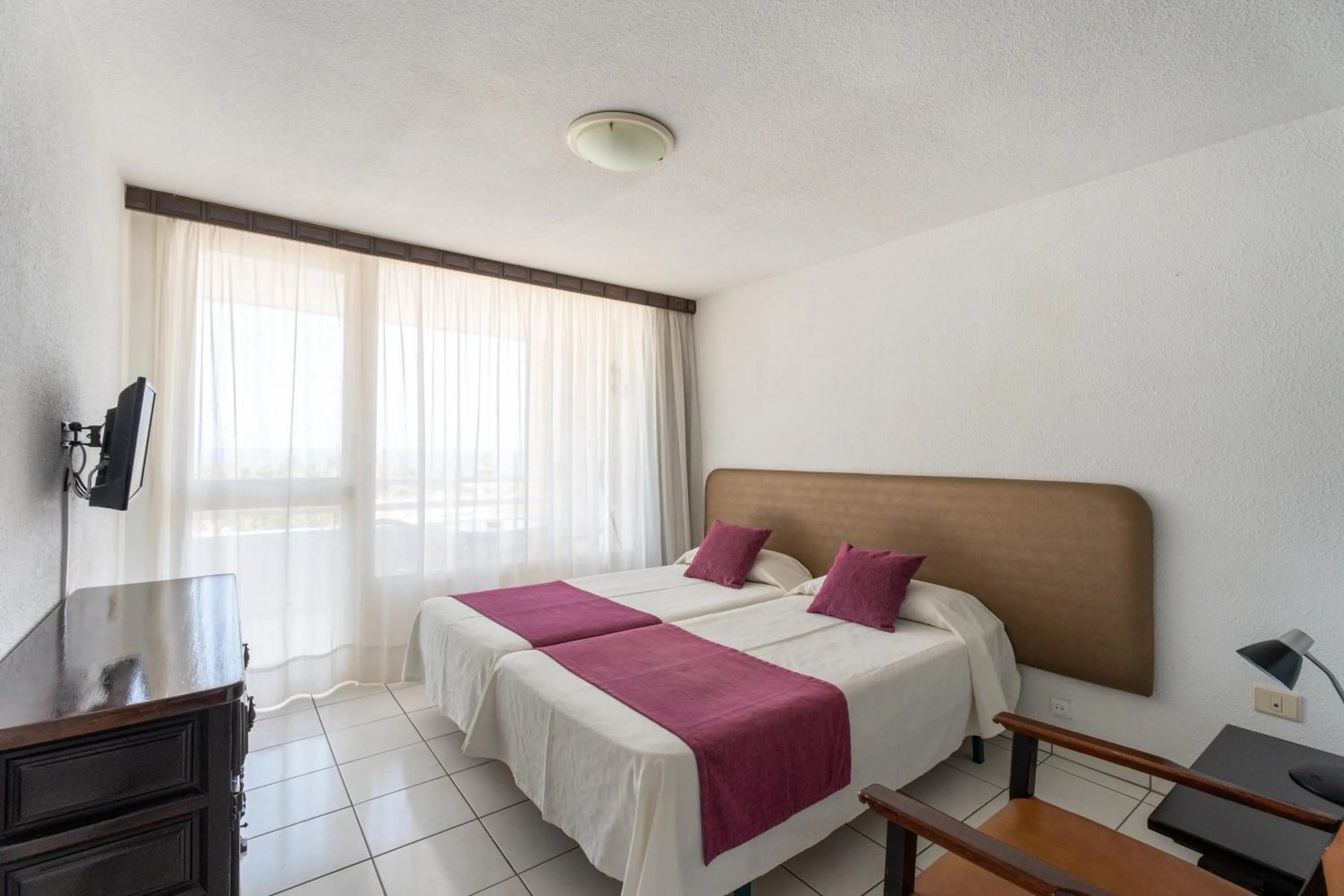 Bed in Apartamentos Borinquen