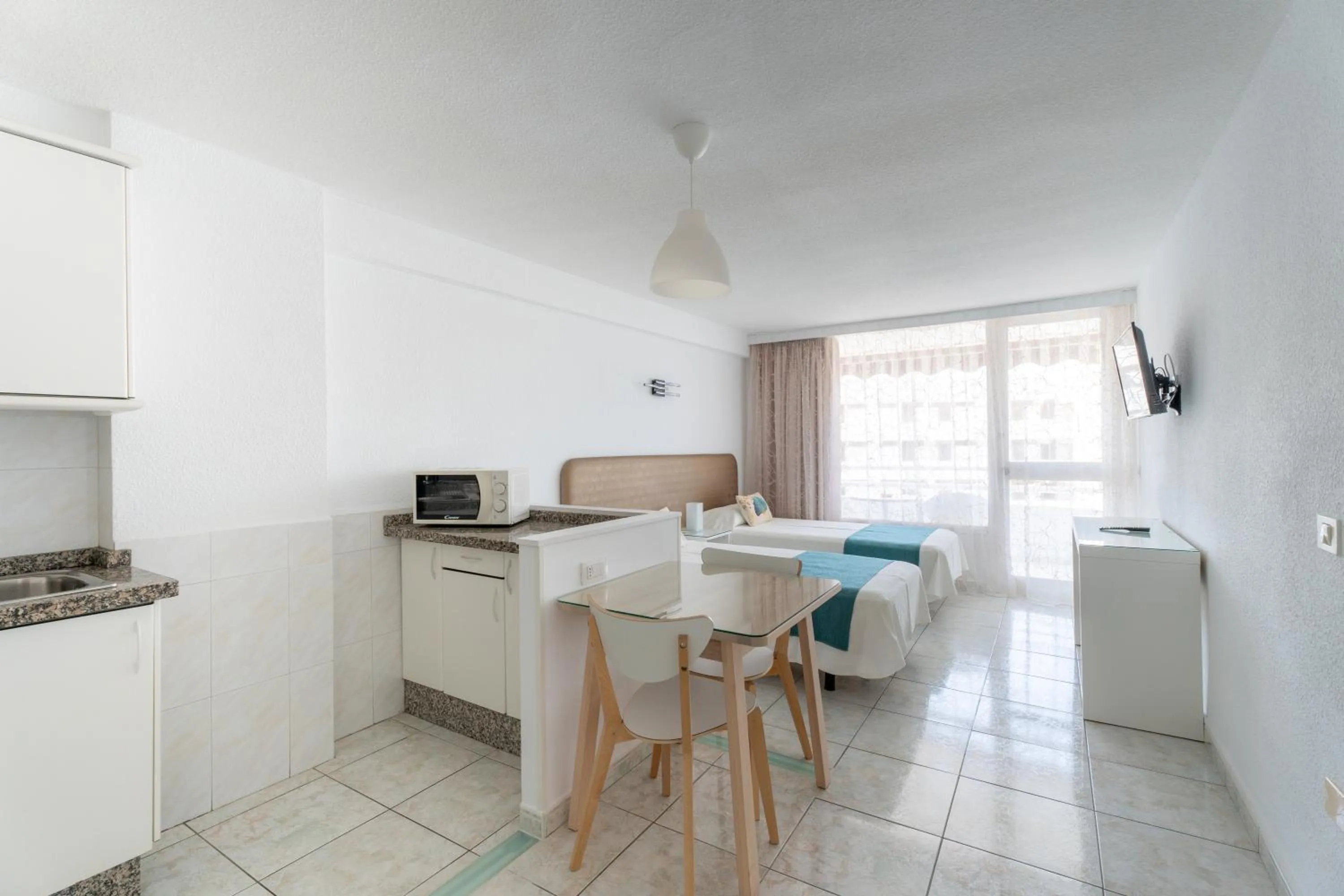 Kitchen or kitchenette in Apartamentos Borinquen