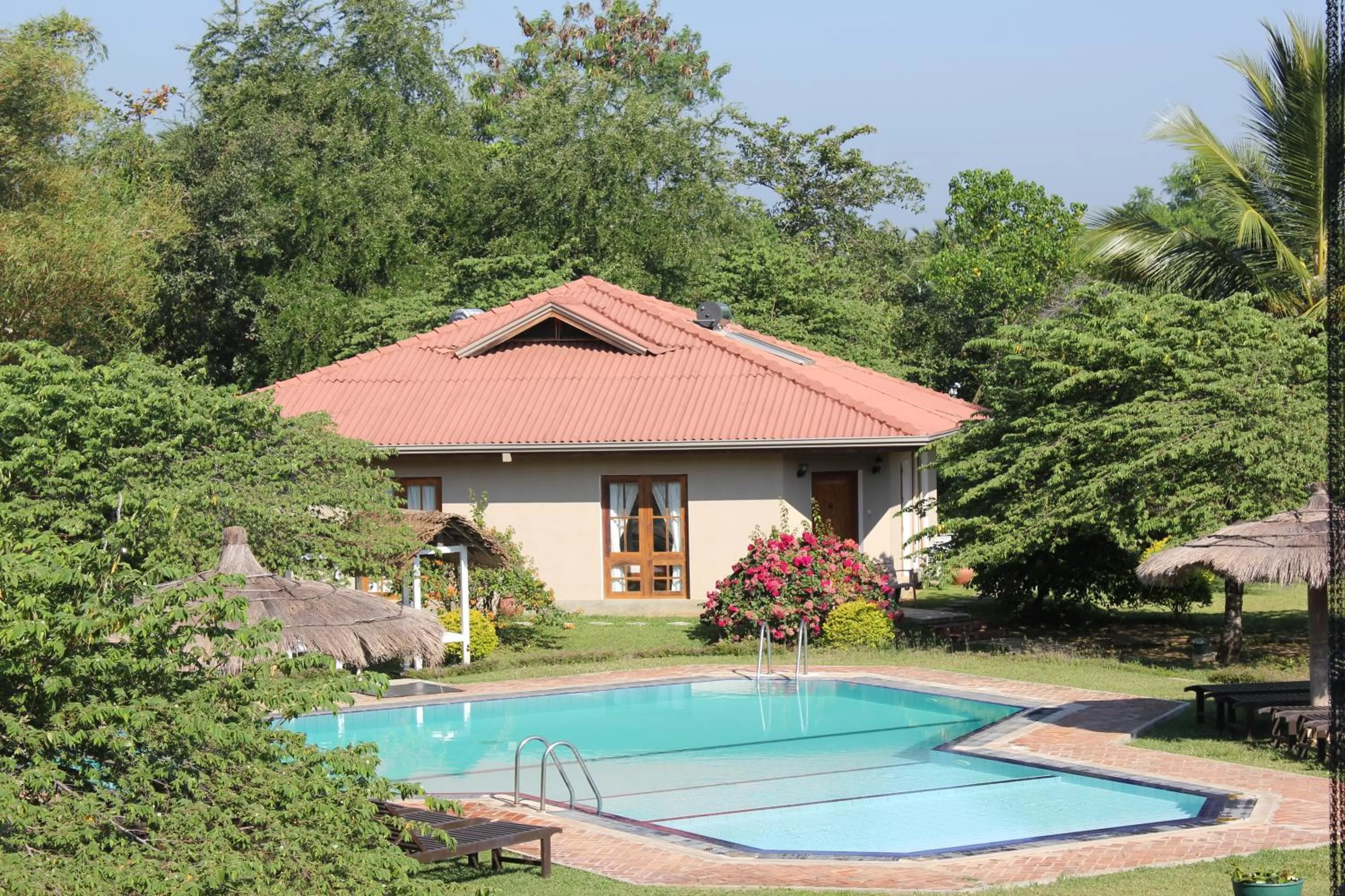 Swimming pool in Hibiscus Garden Hotel