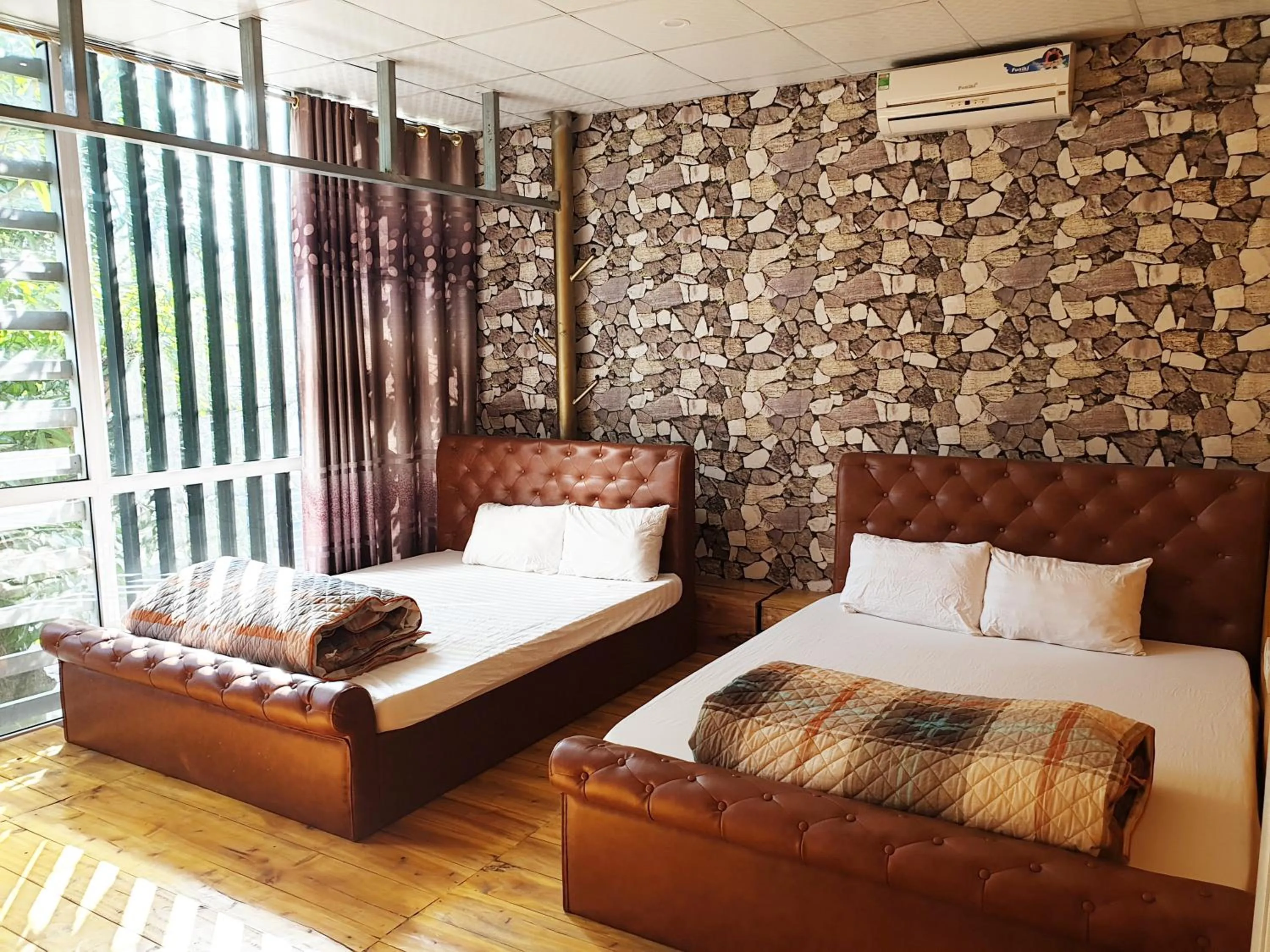 Bed in Long Hotel and motobike rental