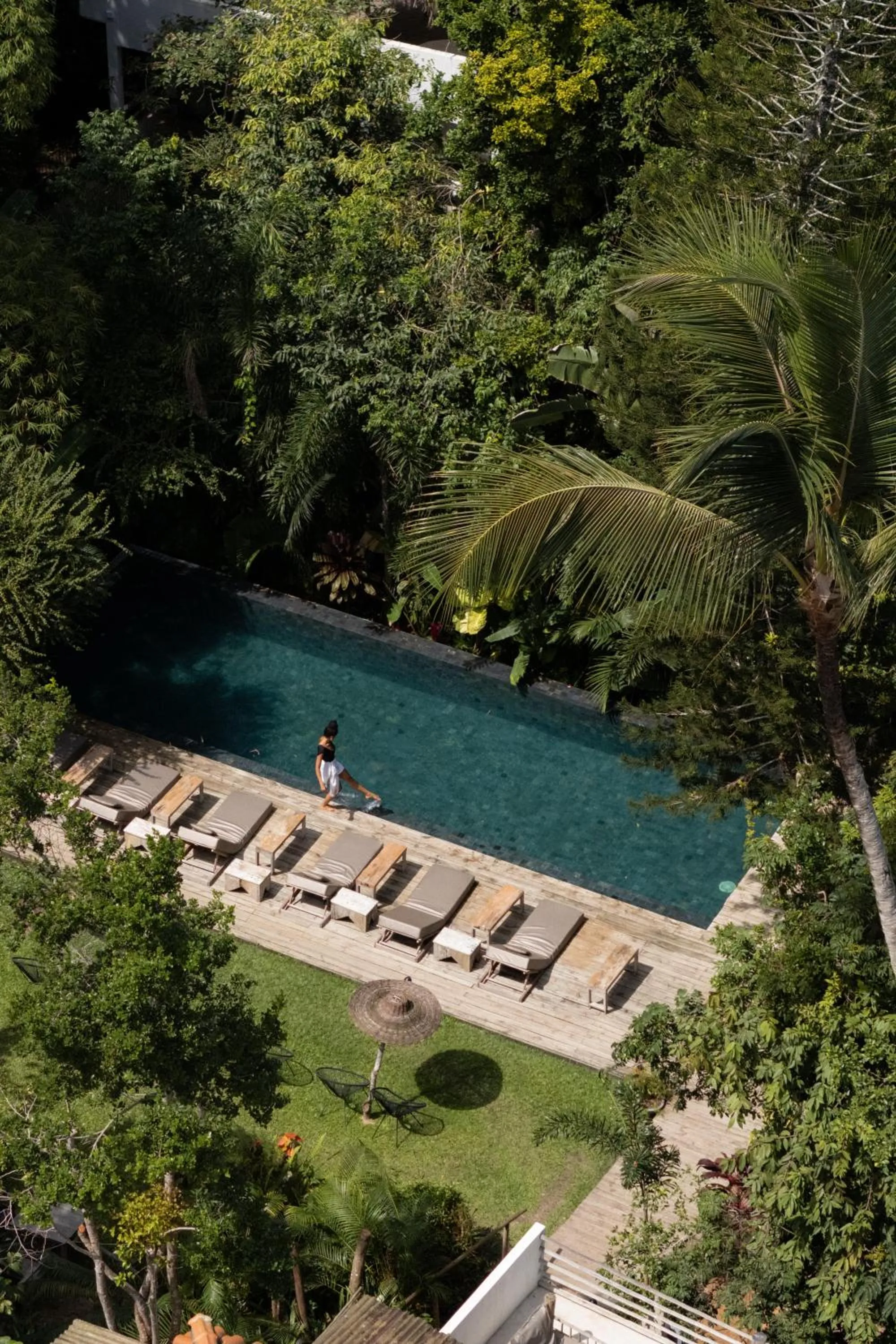 Swimming pool in Pousada Seis e Meia