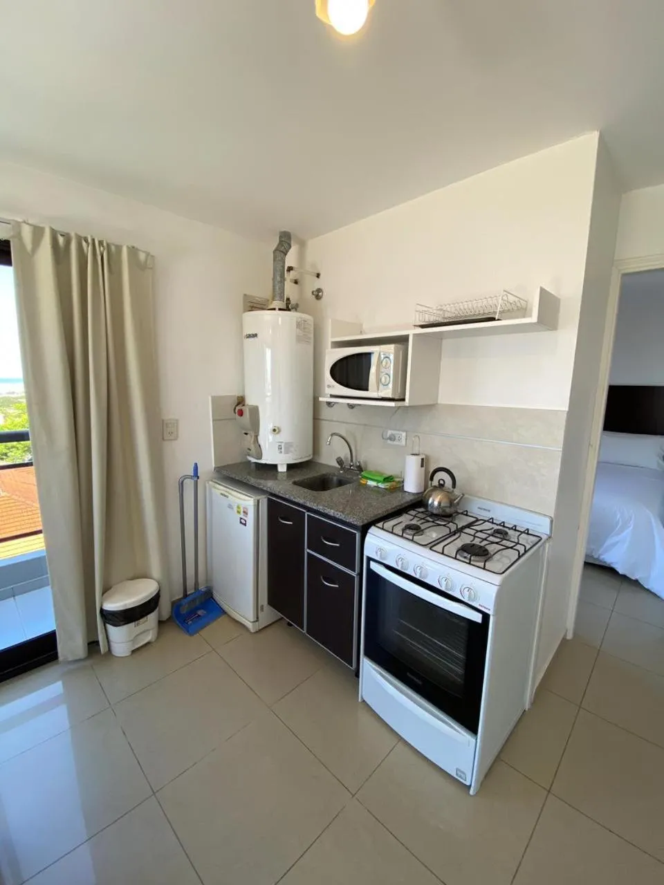 Kitchen or kitchenette in Montecarlo Apartment & Suite
