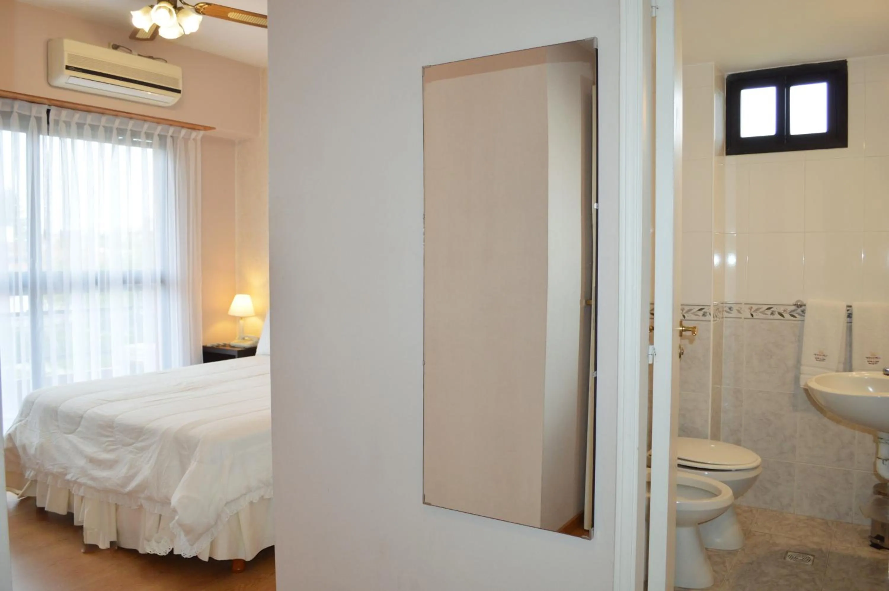 Bathroom, Bed in Montecarlo Apartment & Suite