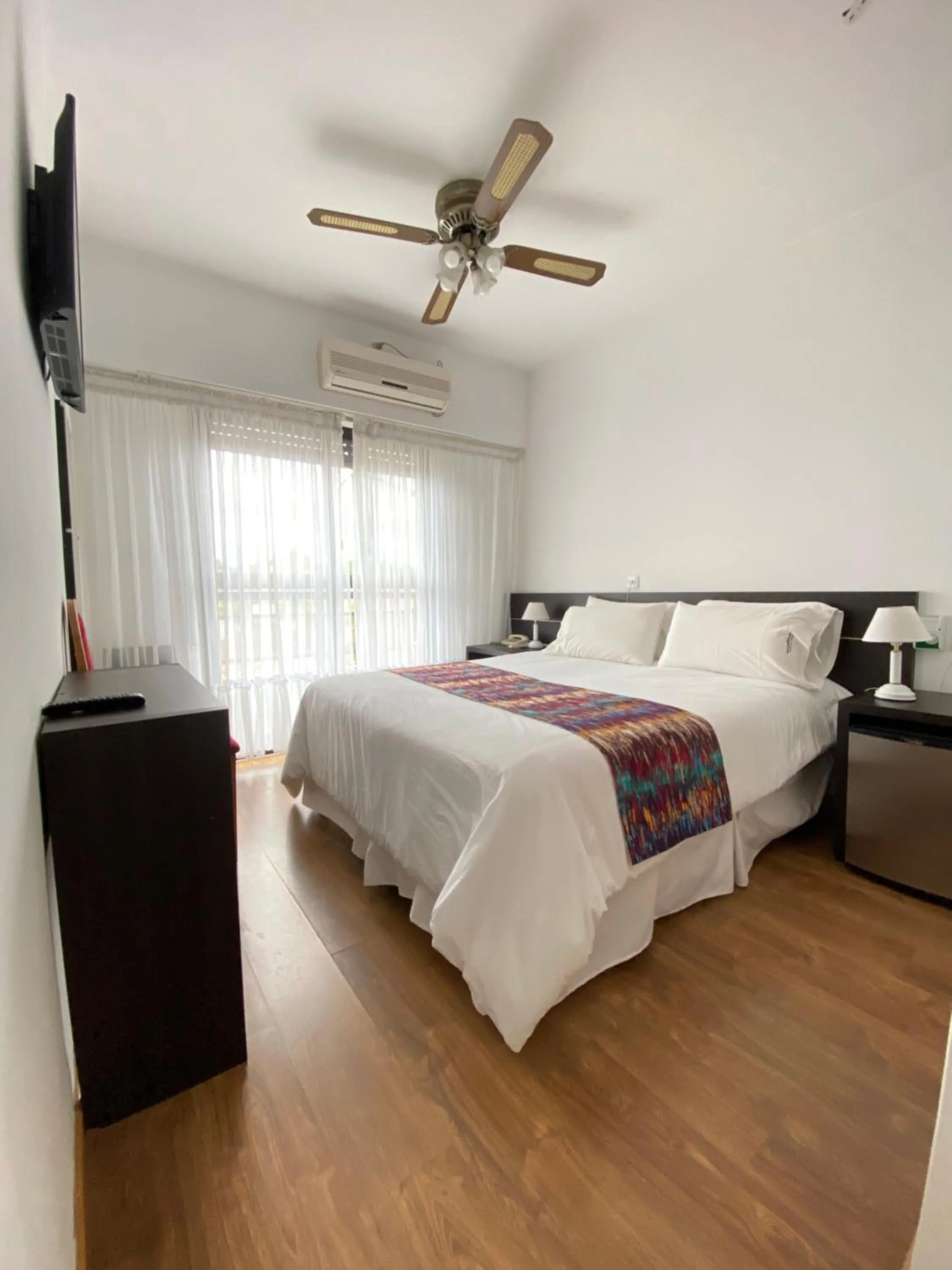 Bed in Montecarlo Apartment & Suite