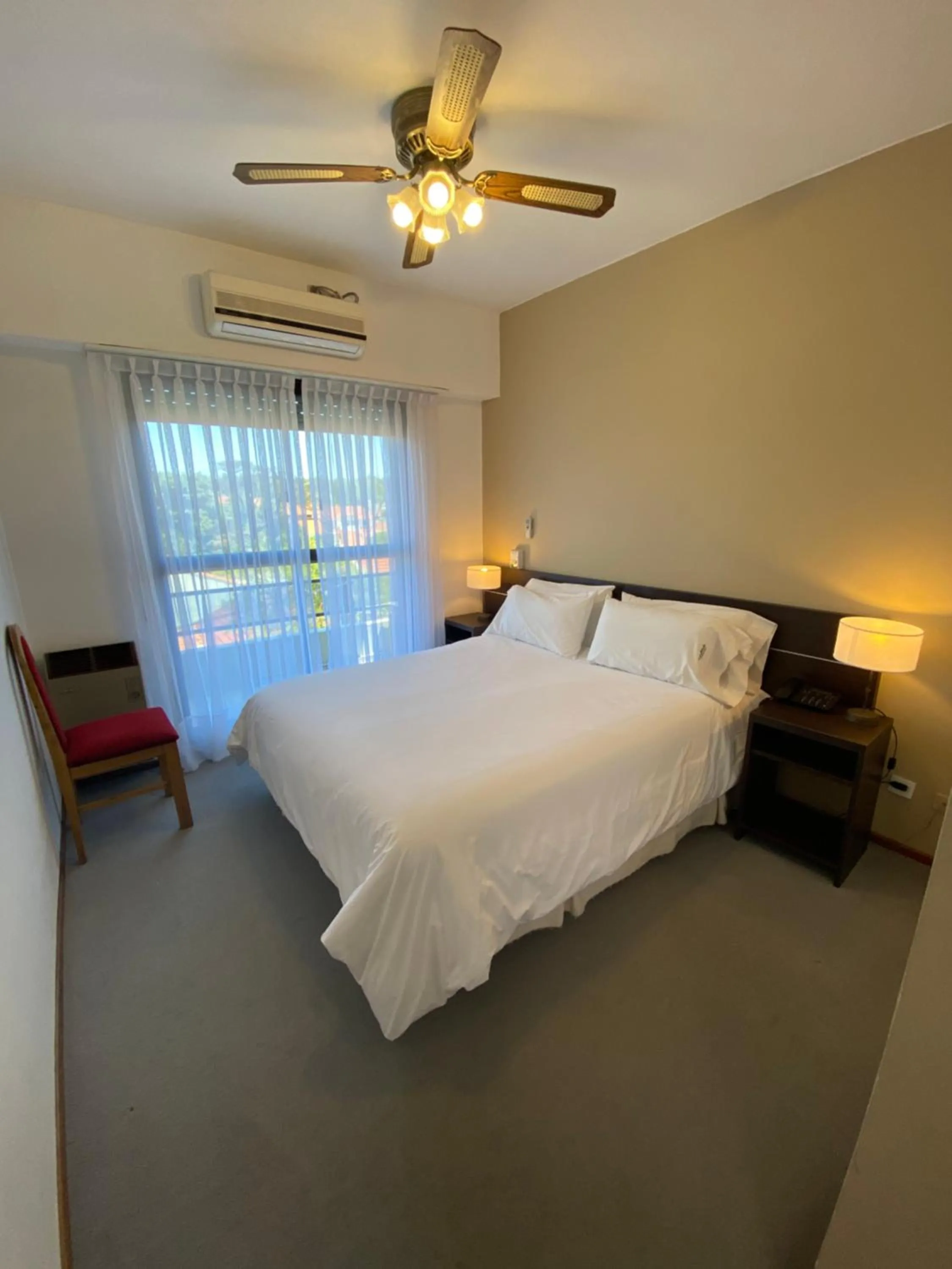 Bed in Montecarlo Apartment & Suite