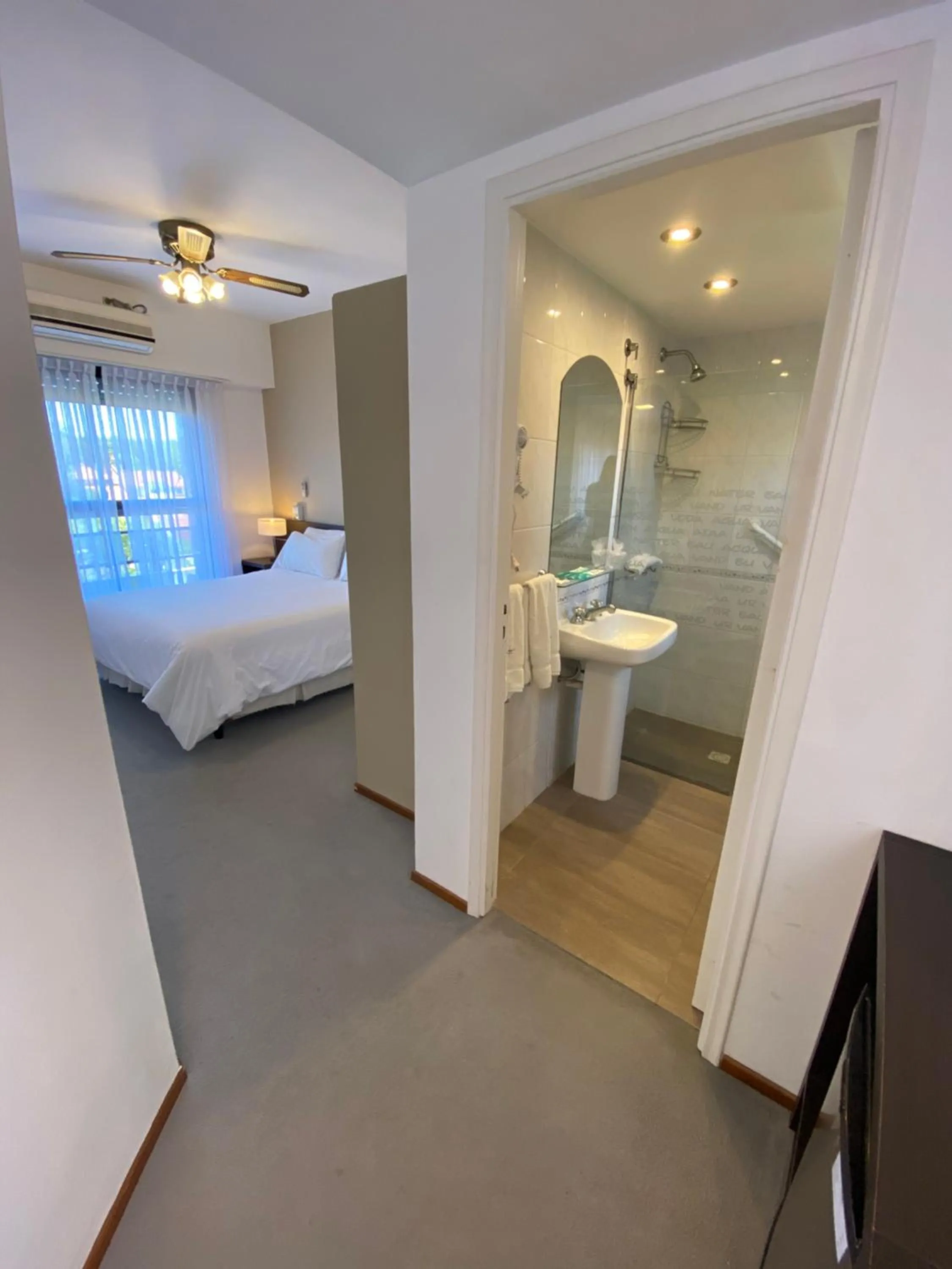 Bathroom, Bed in Montecarlo Apartment & Suite