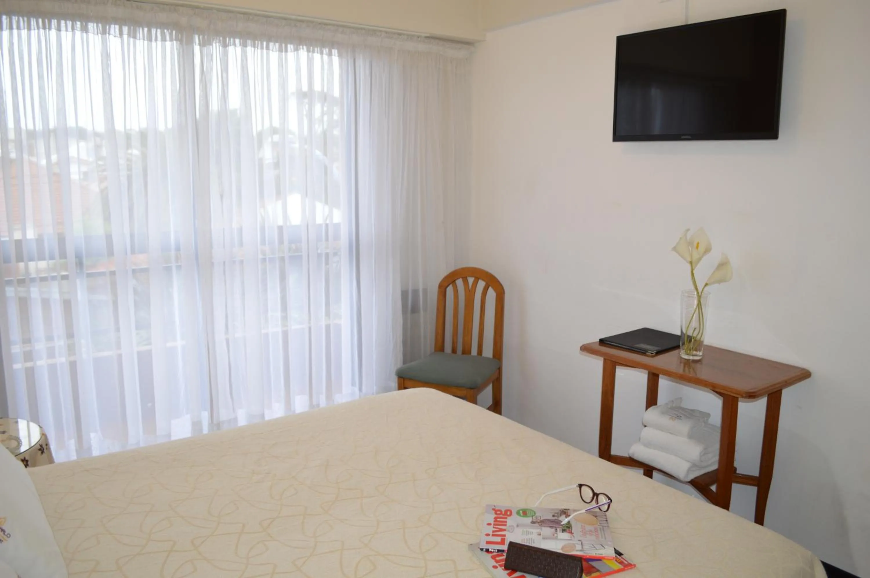 Bed in Montecarlo Apartment & Suite
