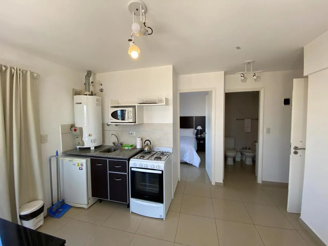 Kitchen or kitchenette in Montecarlo Apartment & Suite