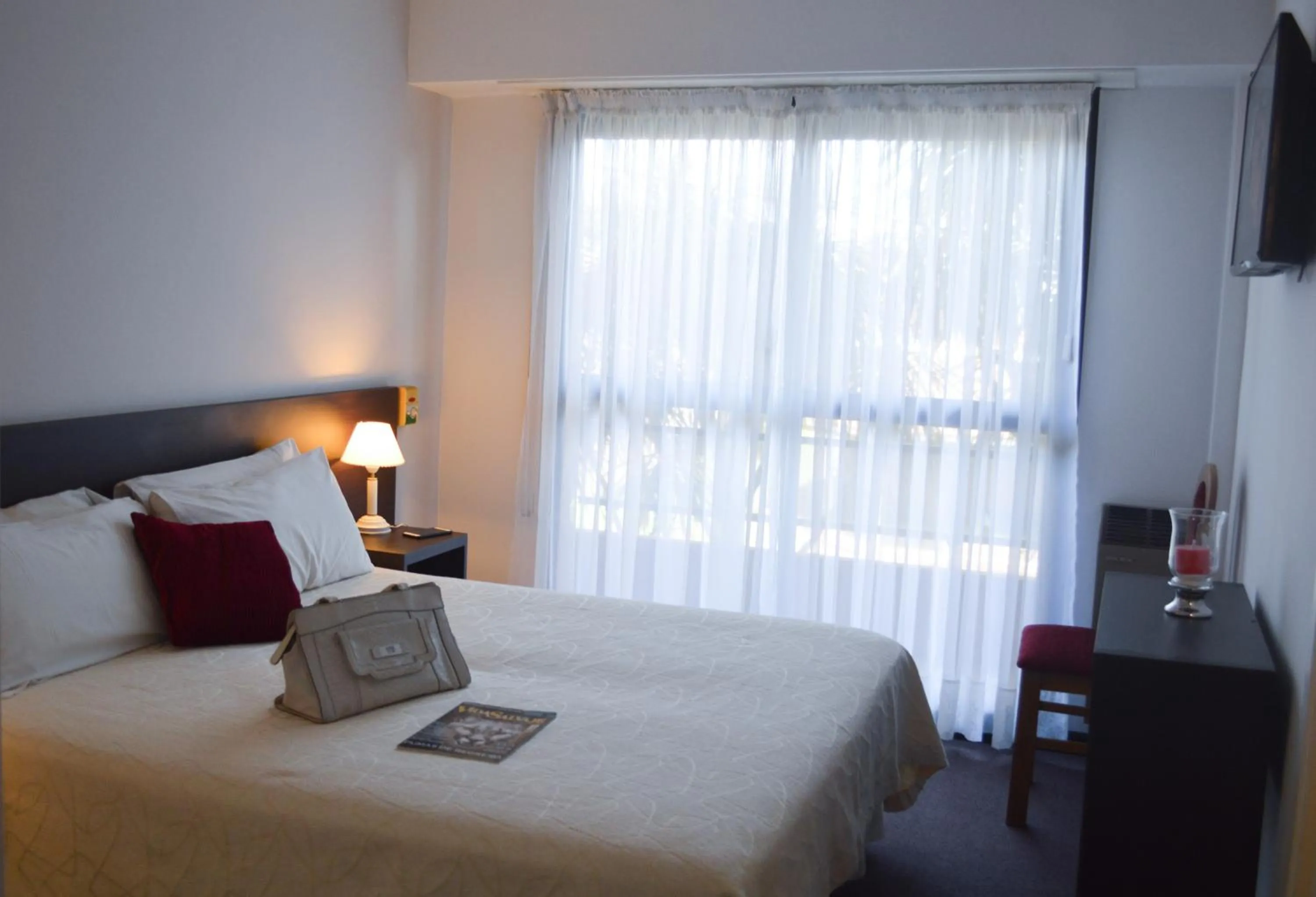 Bed in Montecarlo Apartment & Suite