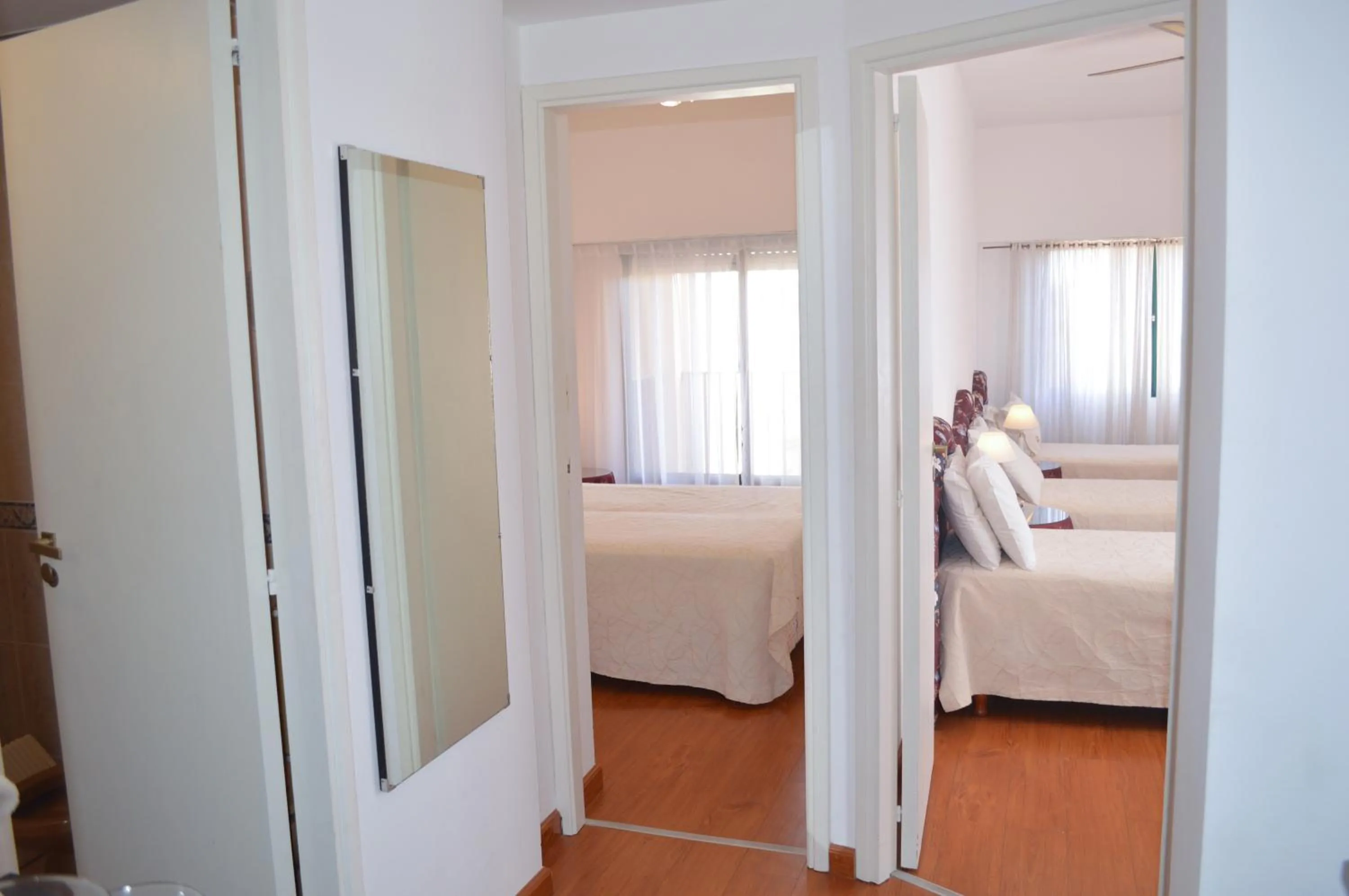 Bed in Montecarlo Apartment & Suite