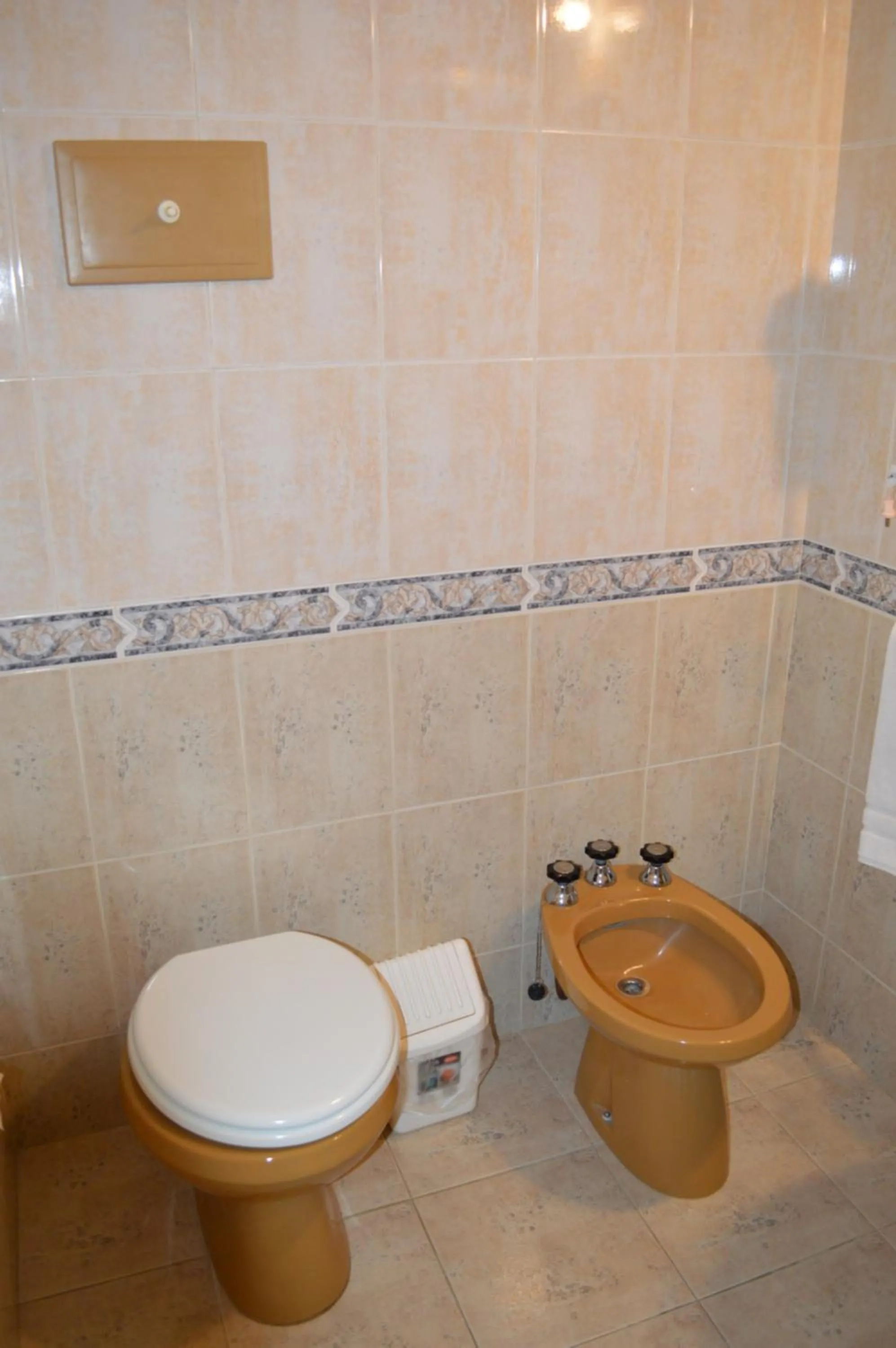 Toilet in Montecarlo Apartment & Suite