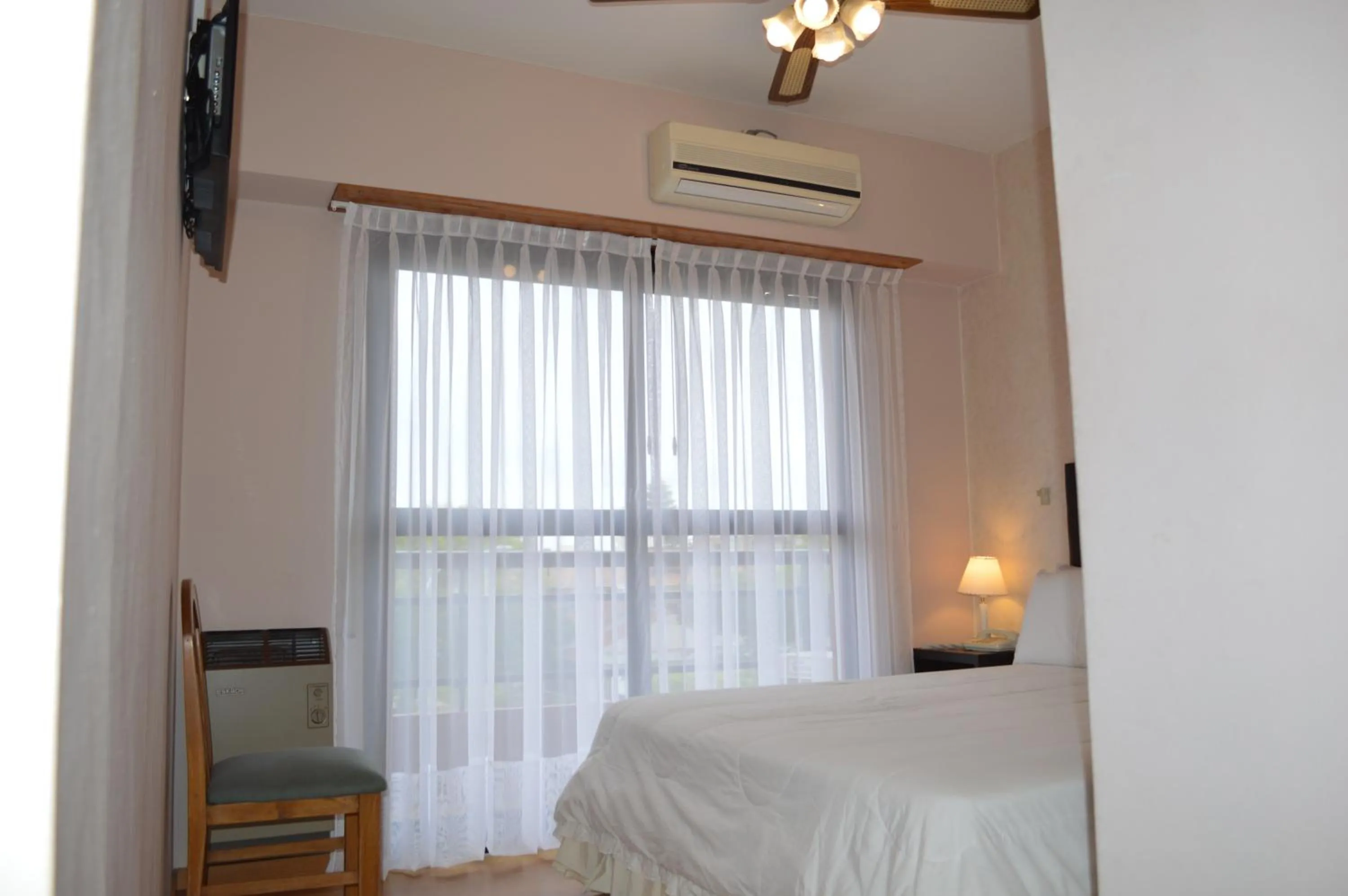 Bed in Montecarlo Apartment & Suite