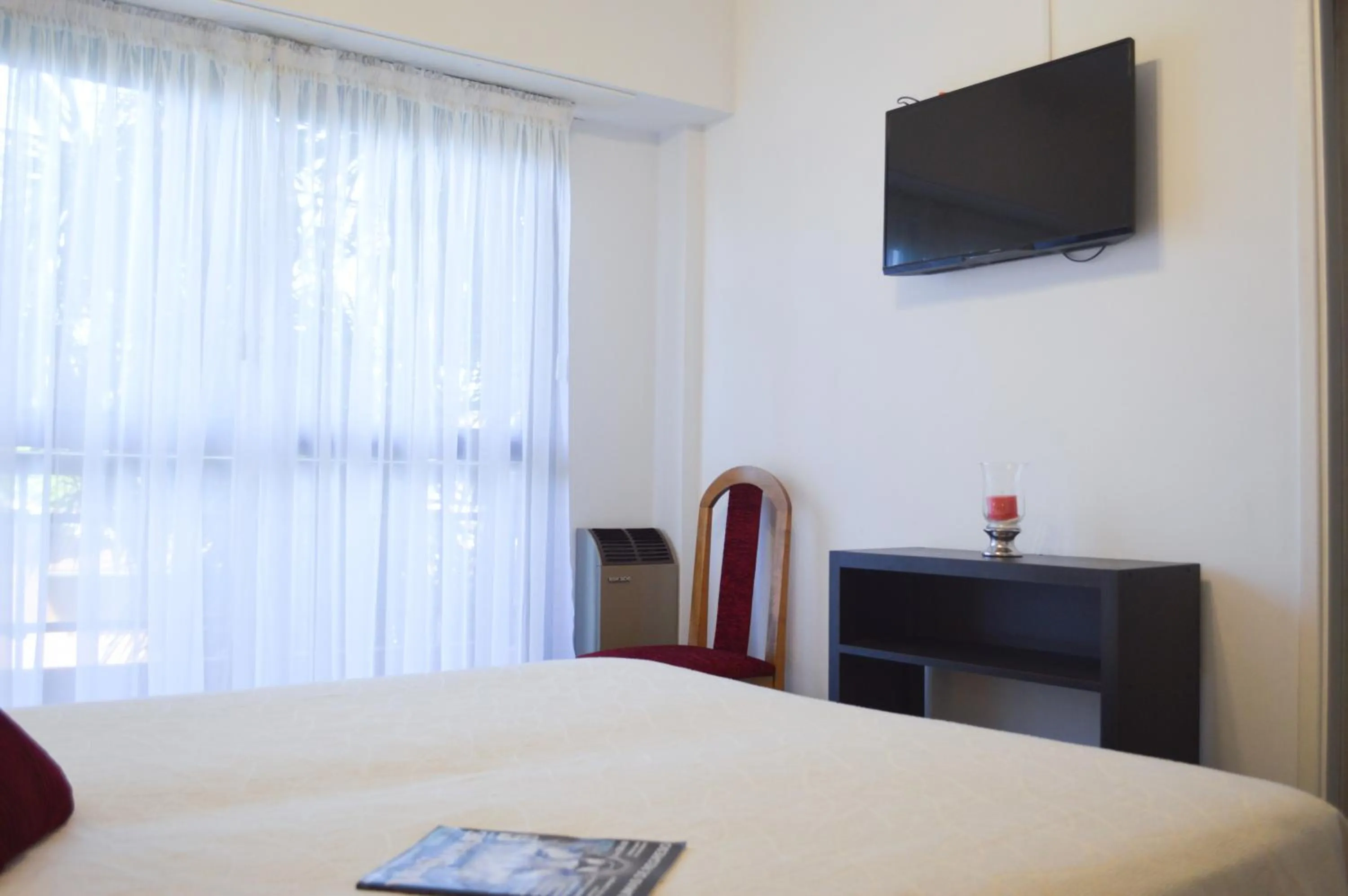 Bed in Montecarlo Apartment & Suite