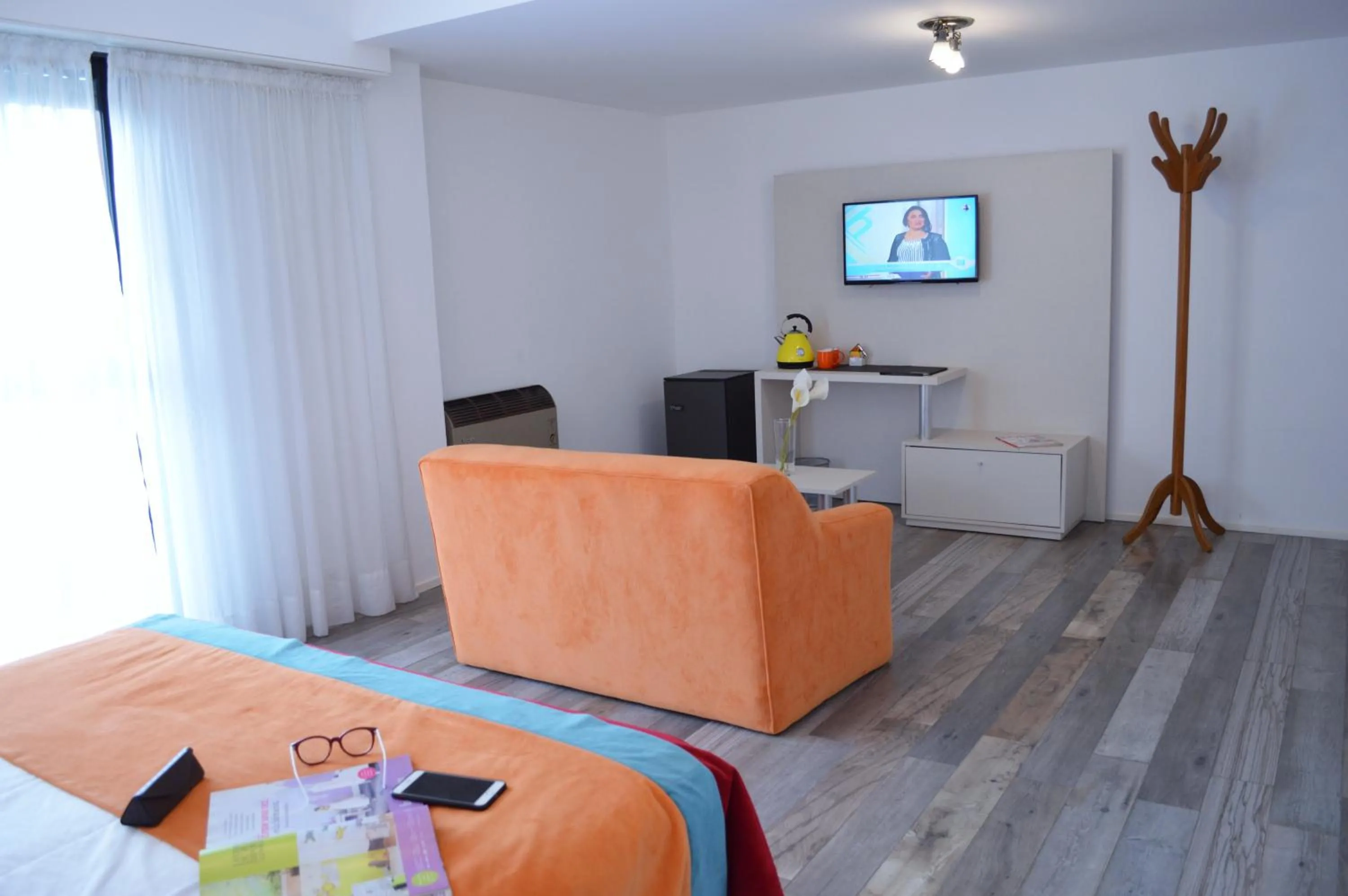 TV and multimedia in Montecarlo Apartment & Suite