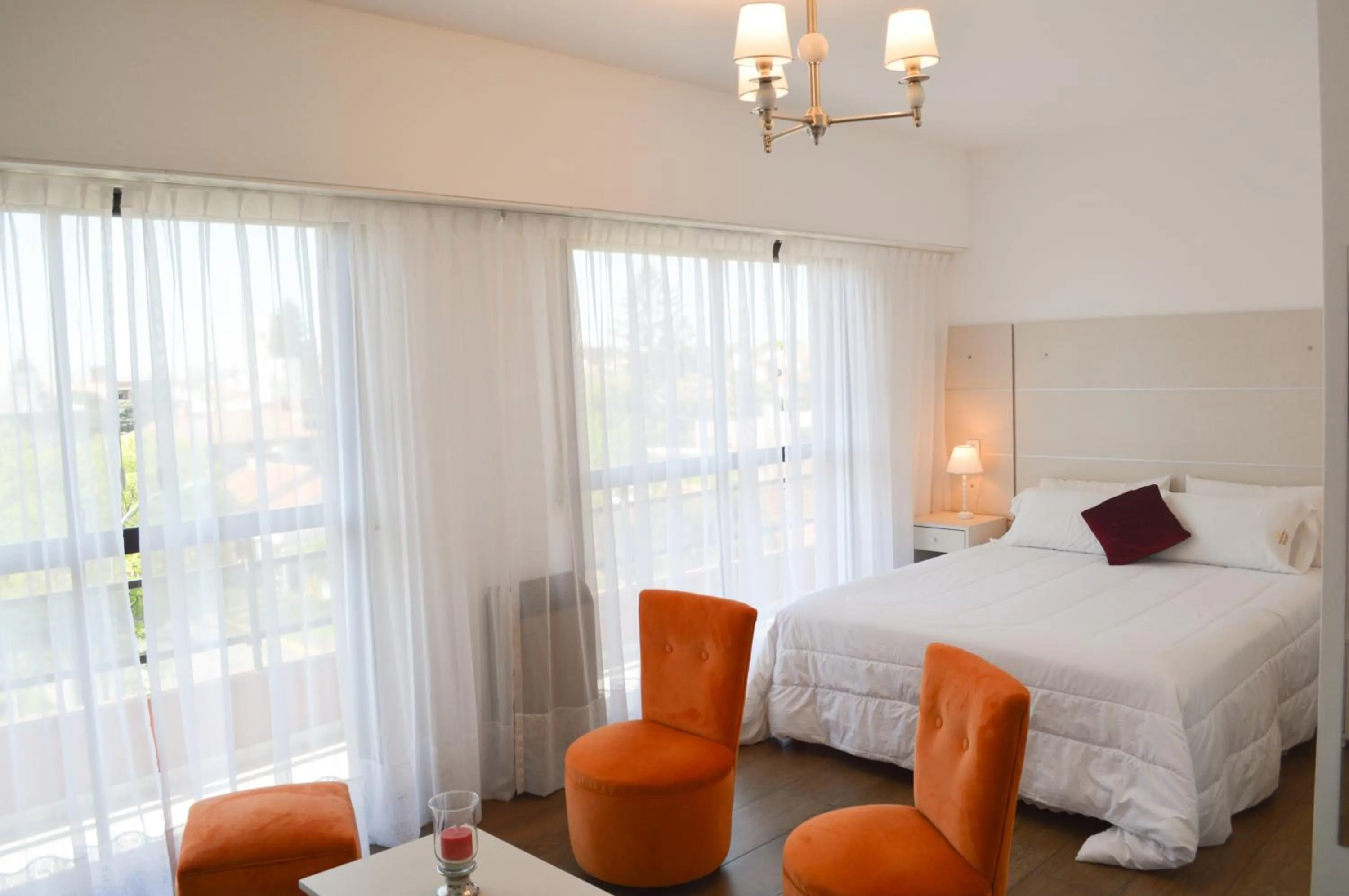 Bed in Montecarlo Apartment & Suite