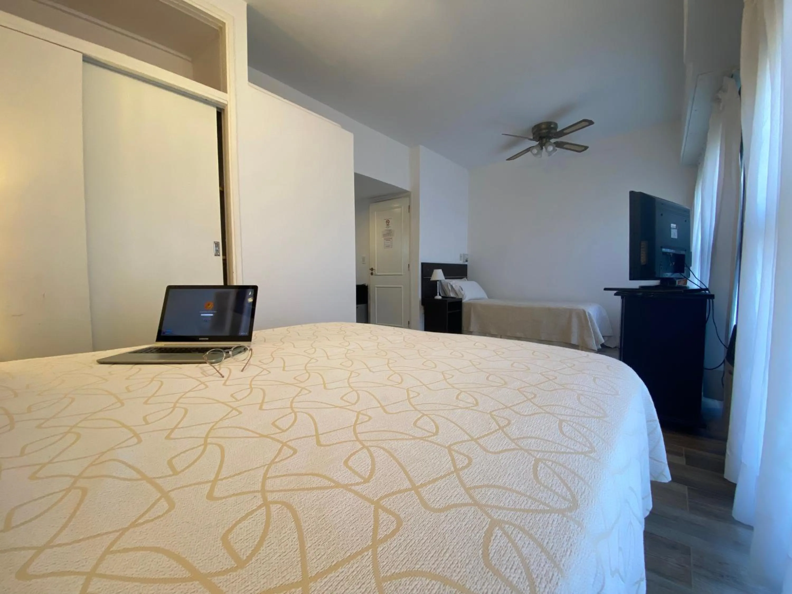 Photo of the whole room, Bed in Montecarlo Apartment & Suite