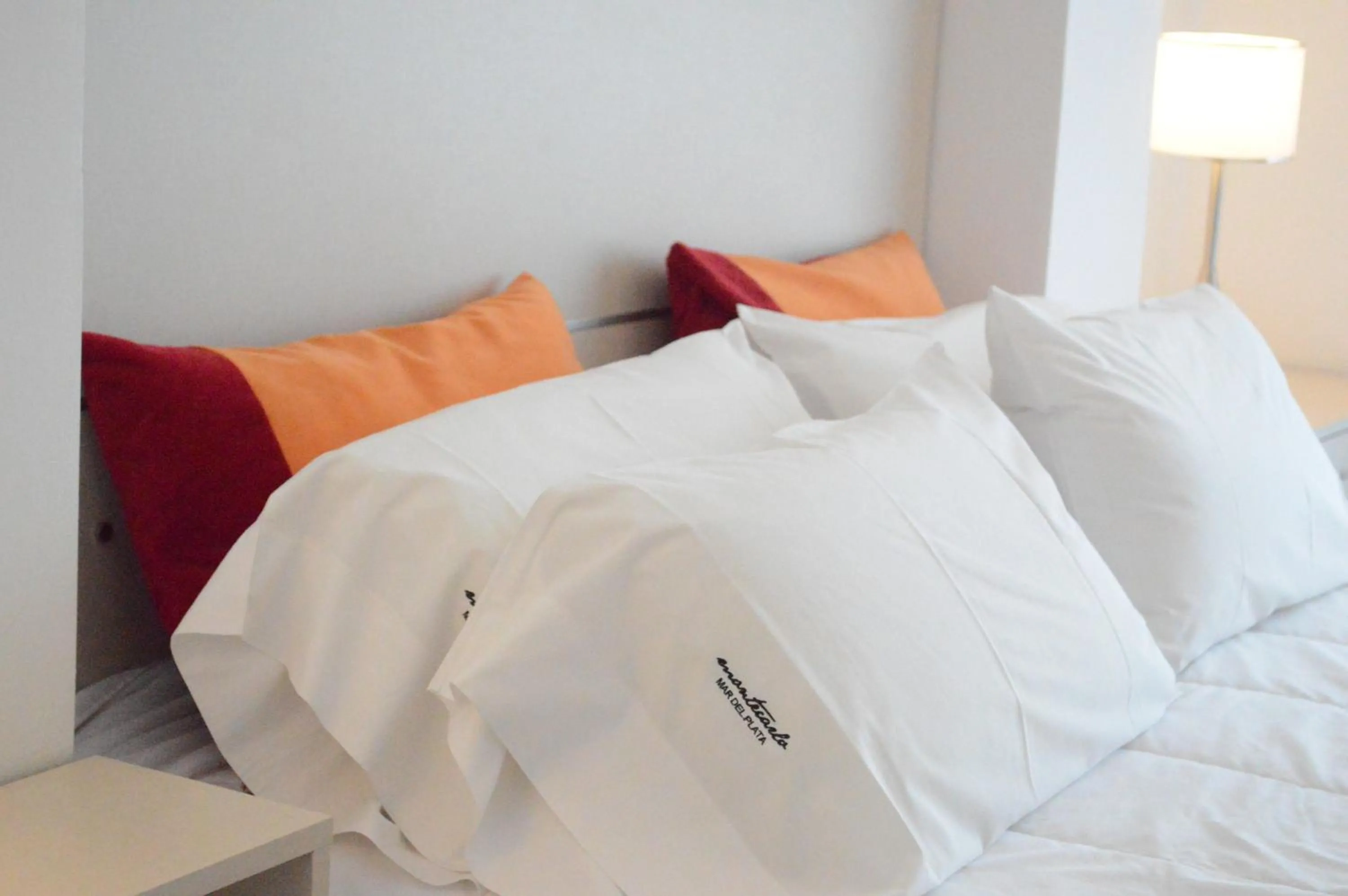 Bed in Montecarlo Apartment & Suite