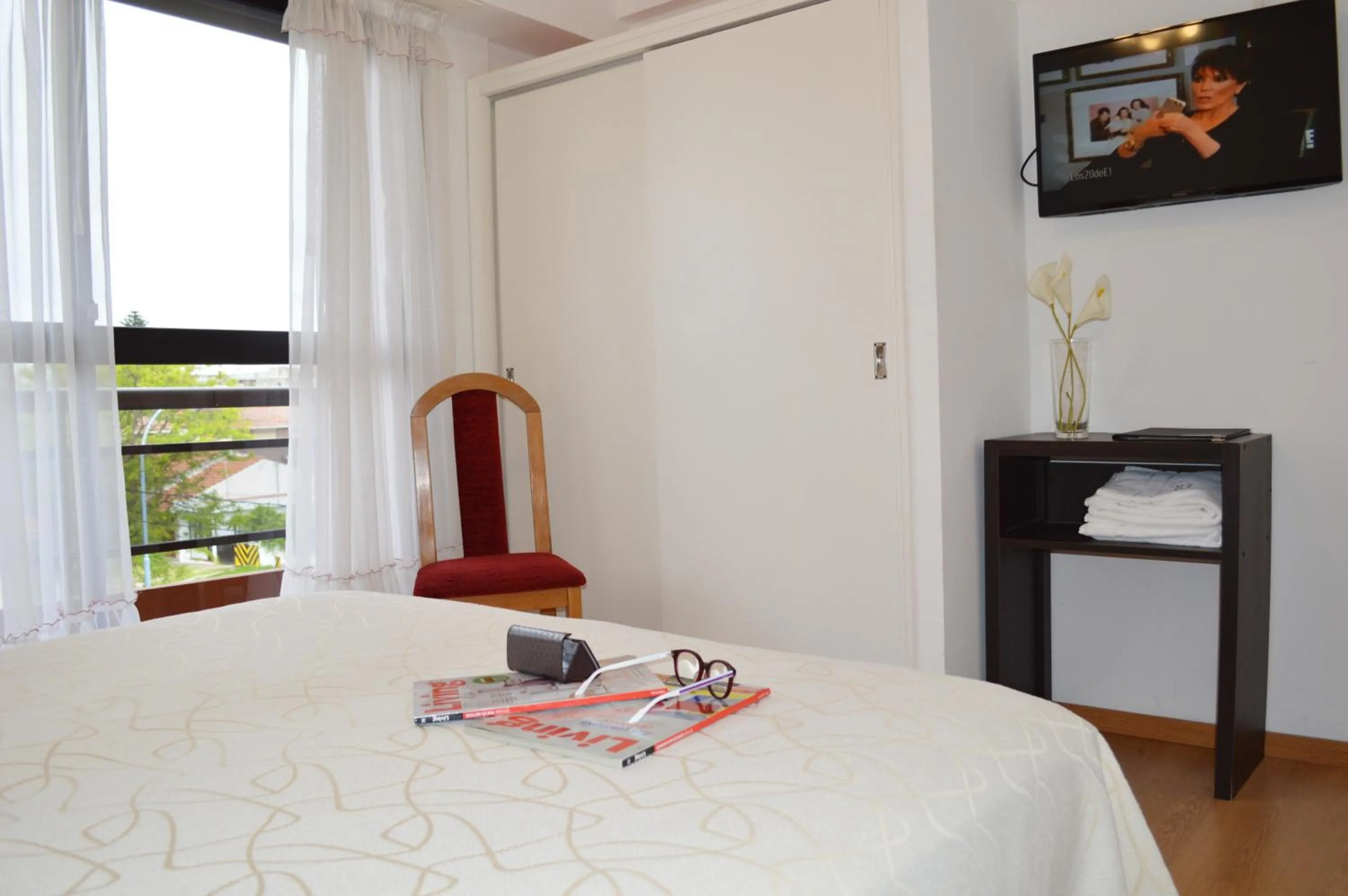 Bed in Montecarlo Apartment & Suite