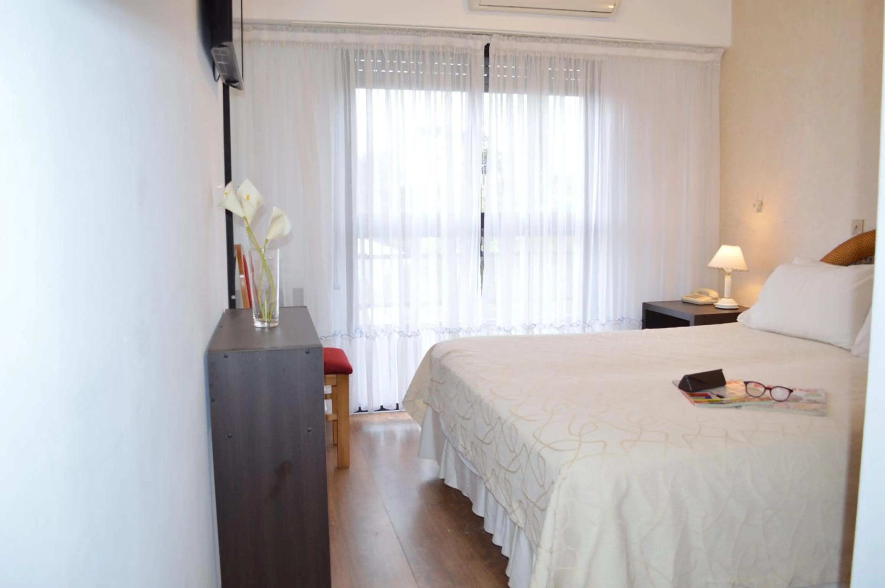 Bed in Montecarlo Apartment & Suite