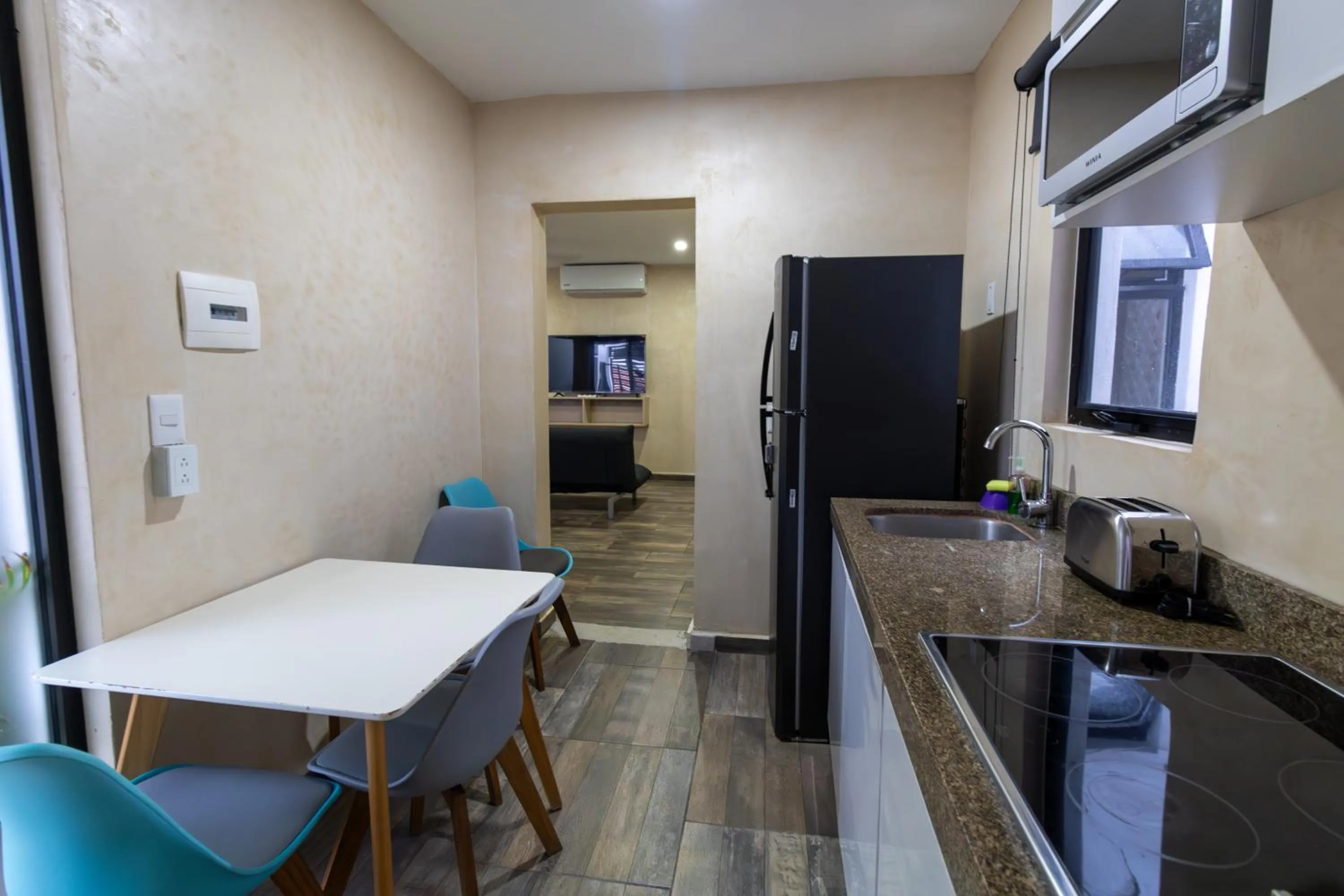 Kitchen or kitchenette in Arkana 9 Suites by Grupo Amber