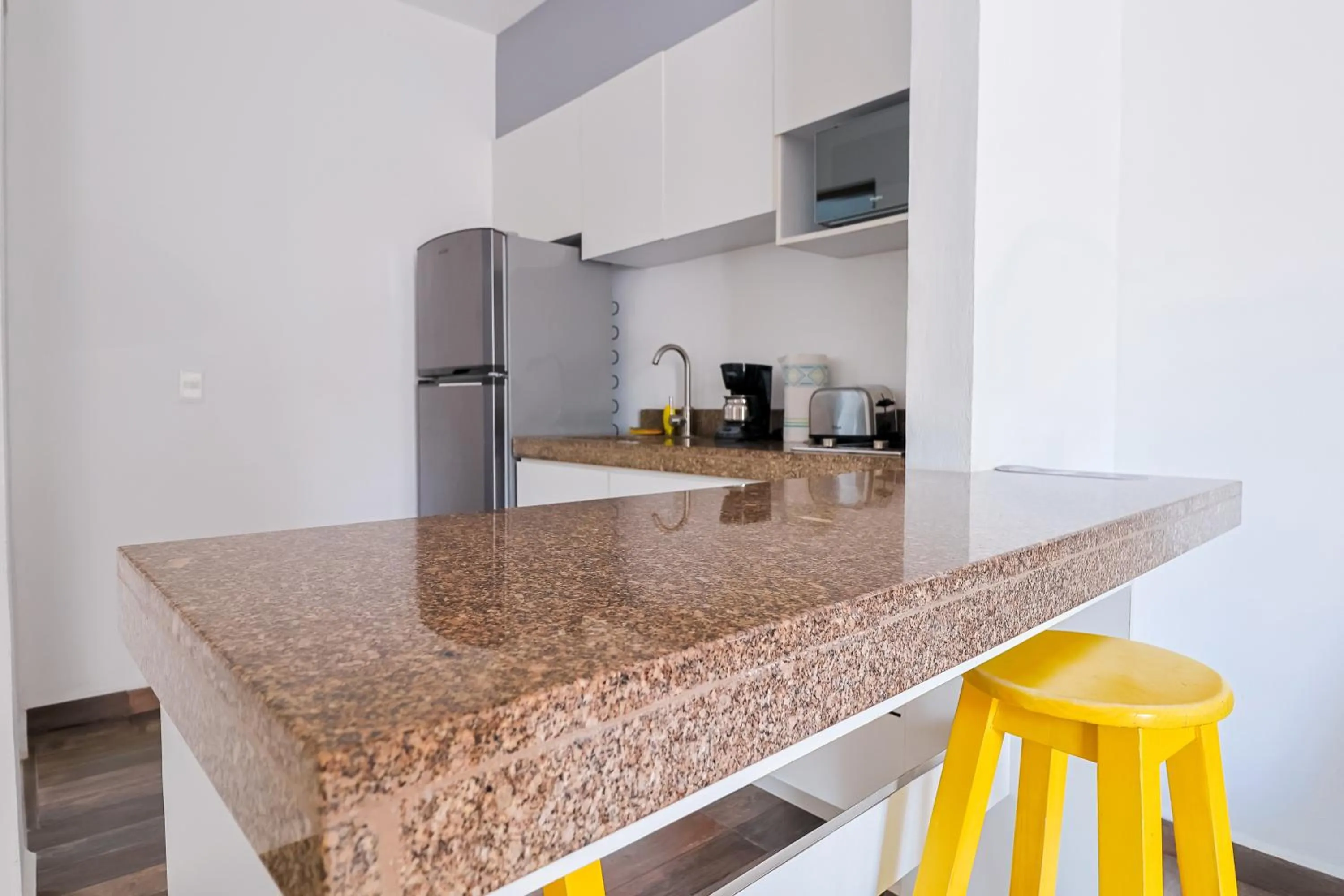 Kitchen or kitchenette in Arkana 9 Suites by Grupo Amber