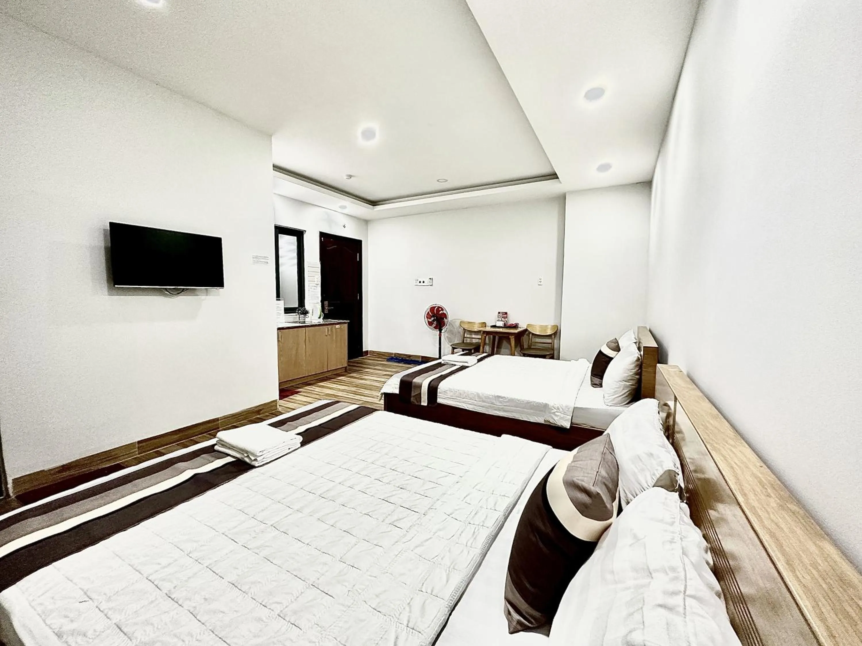 Bed in The Jade Hotel near Tan Son Nhat Airport