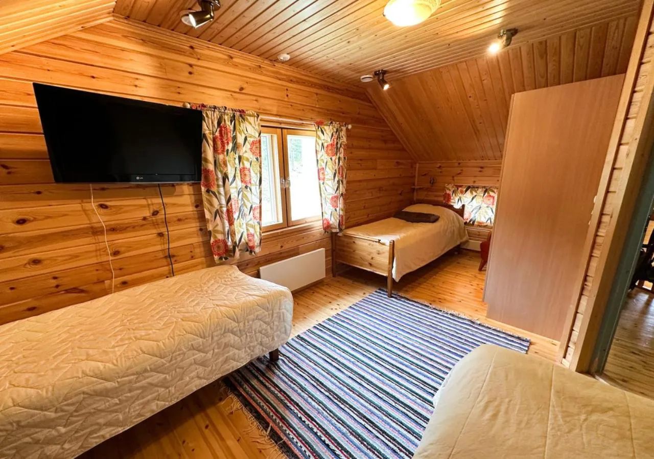 Bedroom, Bed in Napapiirin Järvilomat