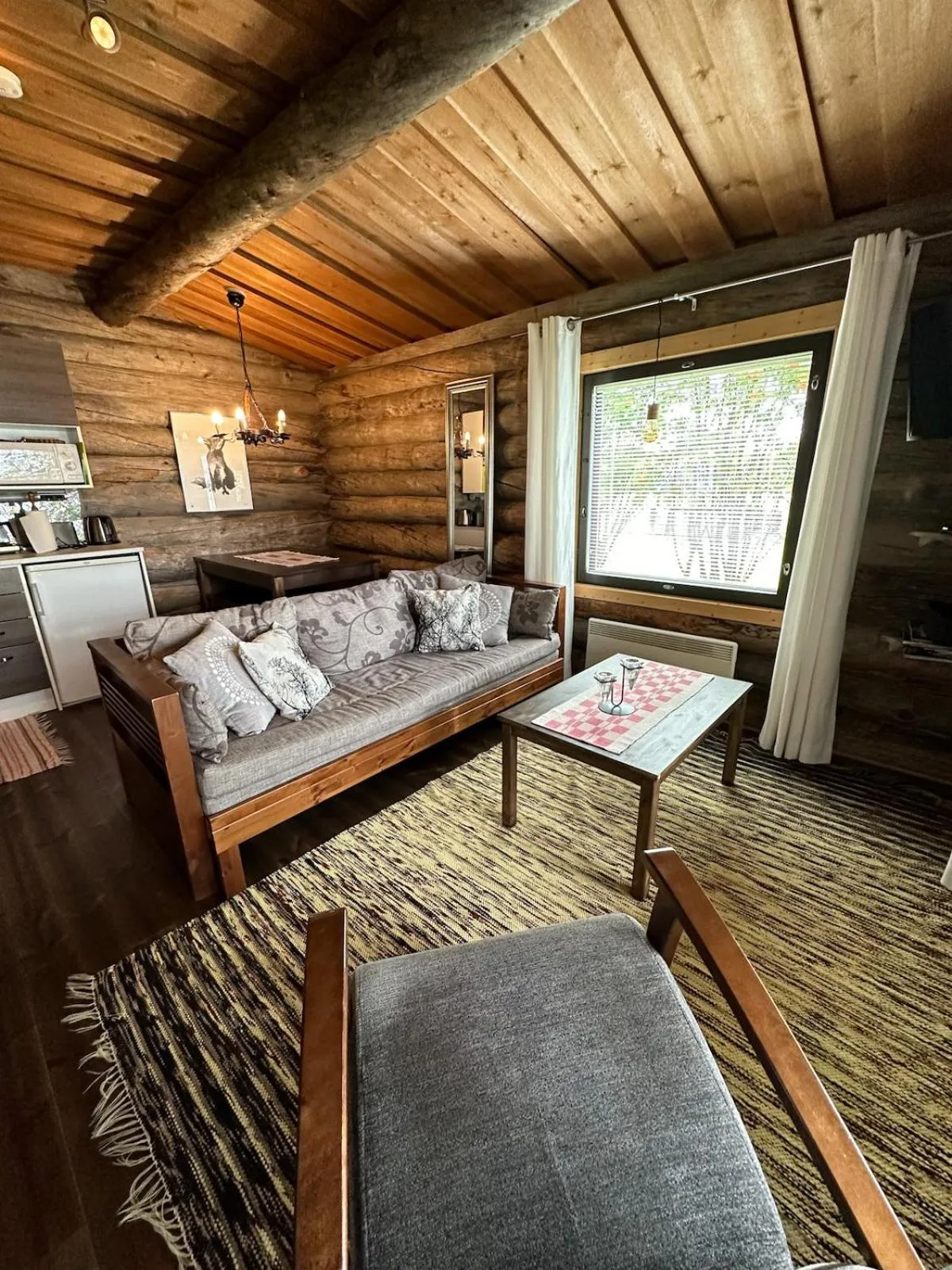 Living room, Bed in Napapiirin Järvilomat