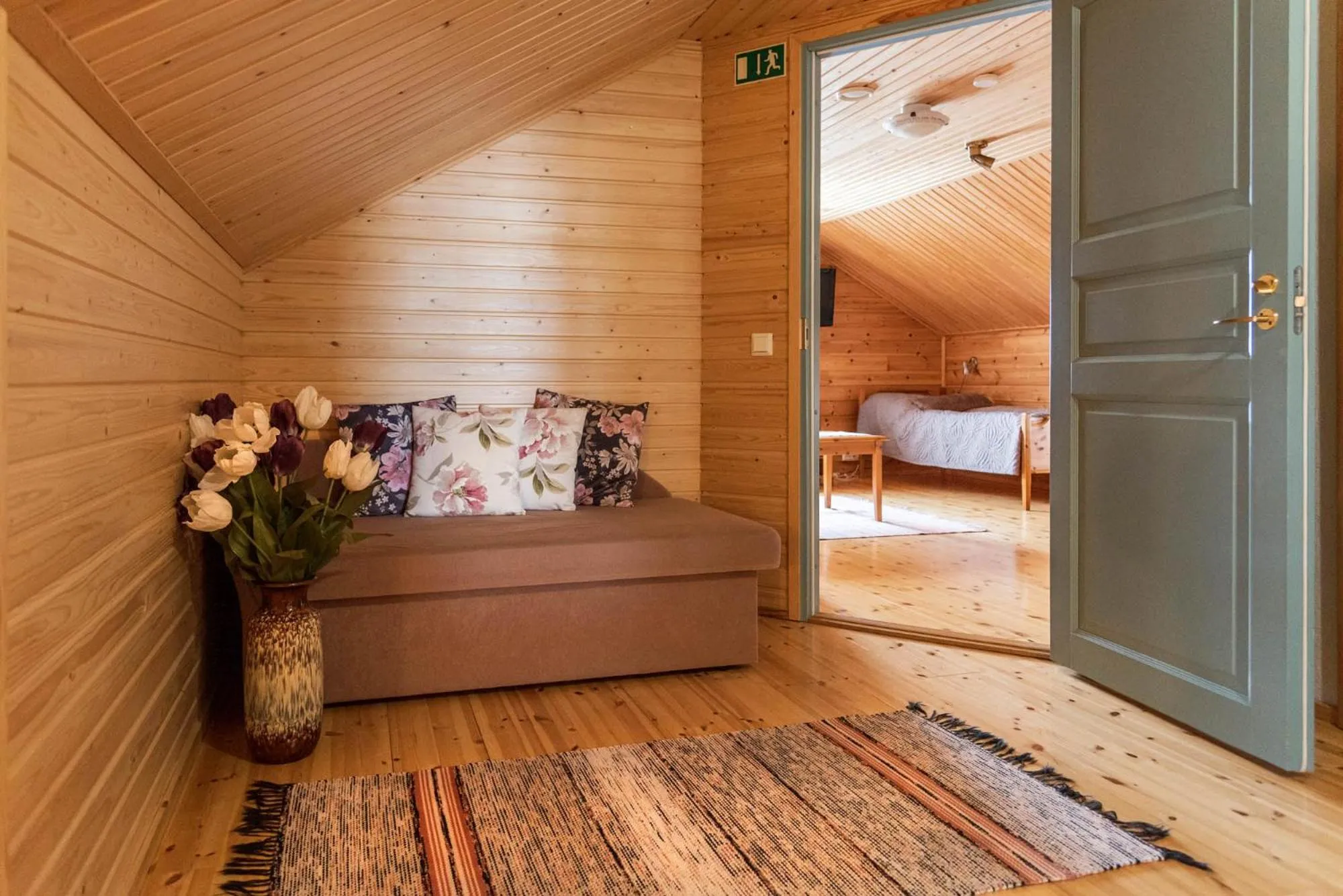 Seating area, Bed in Napapiirin Järvilomat