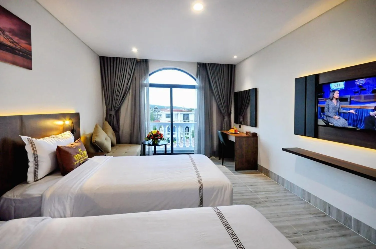 Communal lounge/ TV room, Bed in Crown Nguyen Hoang Hotel