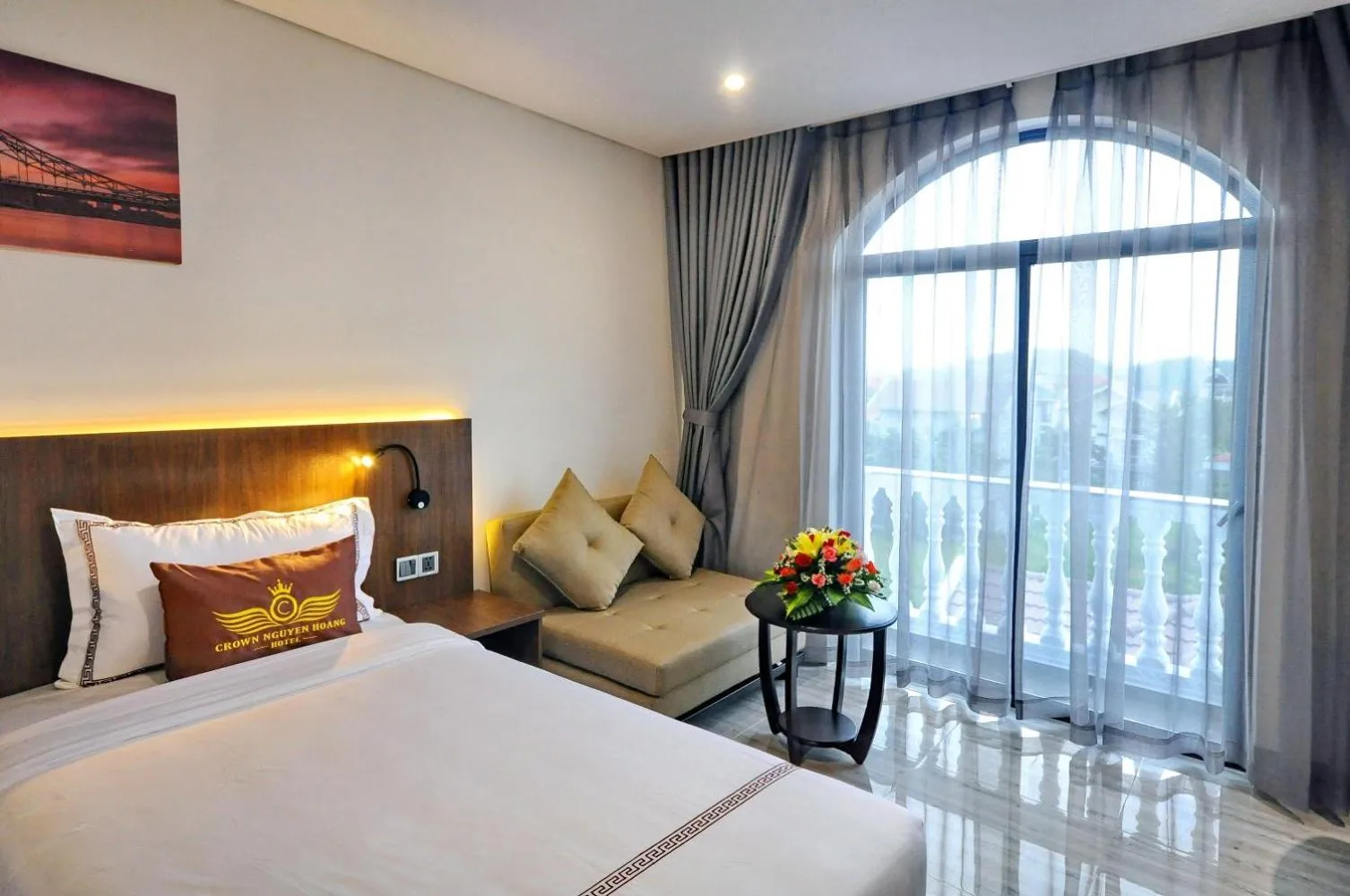 Bed in Crown Nguyen Hoang Hotel