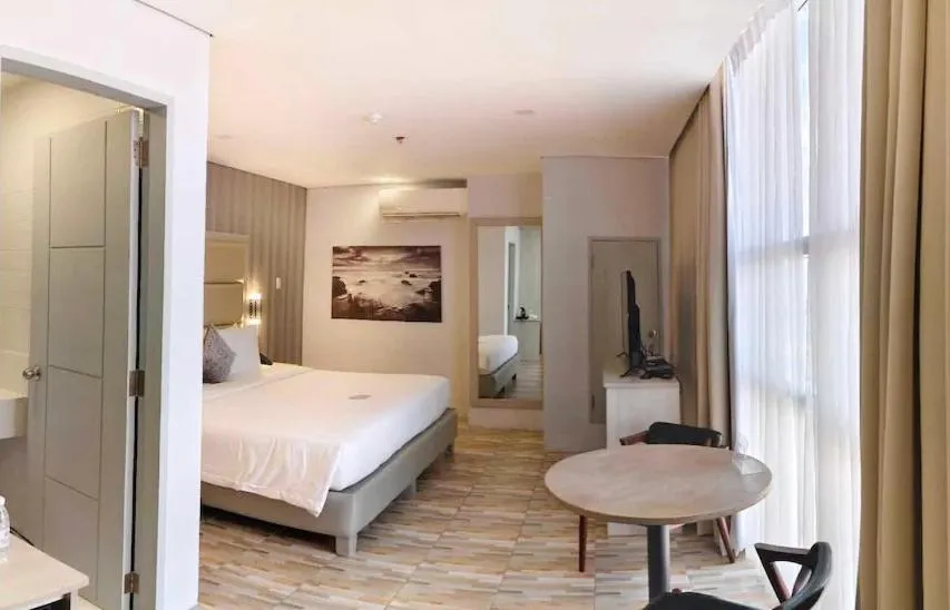 Bed in Amethyst Boutique Hotel Cebu powered by Cocotel