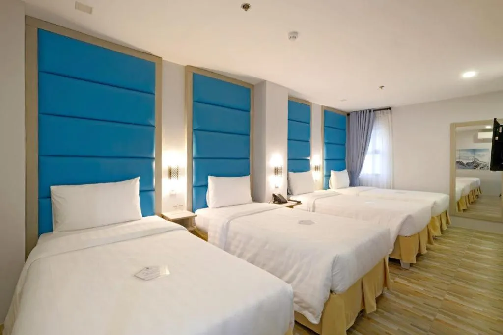 Bed in Amethyst Boutique Hotel Cebu powered by Cocotel