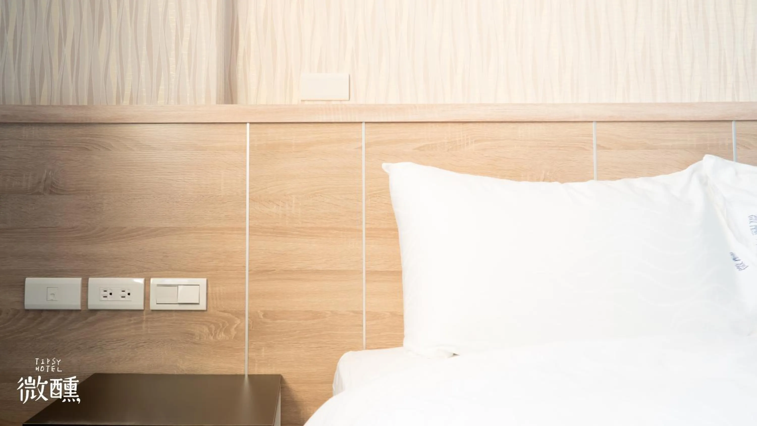 Bed in 金門微醺民宿 Kinmen TipsyHotel B&B