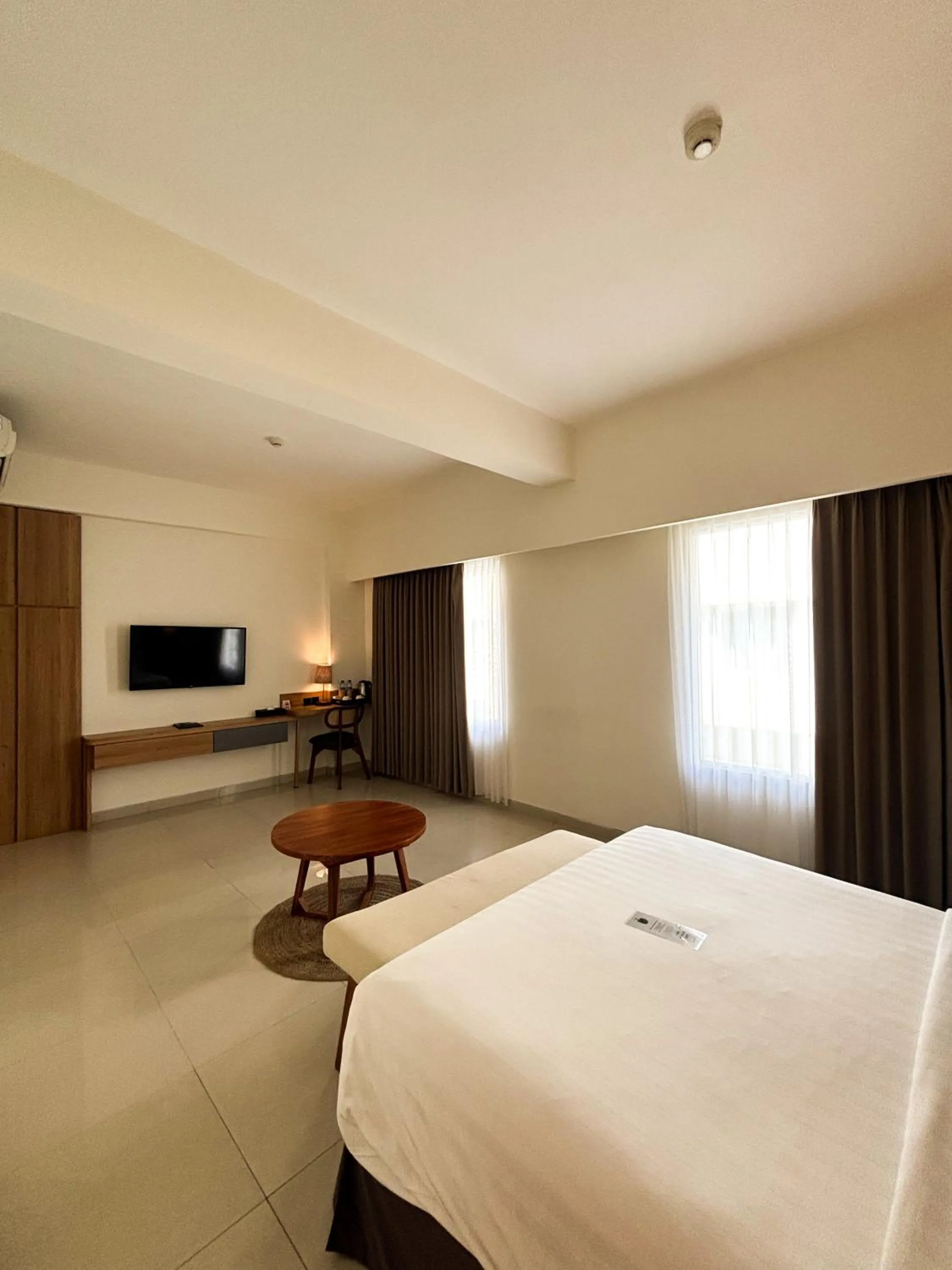 Living room, Bed in Crystalkuta Hotel - Bali