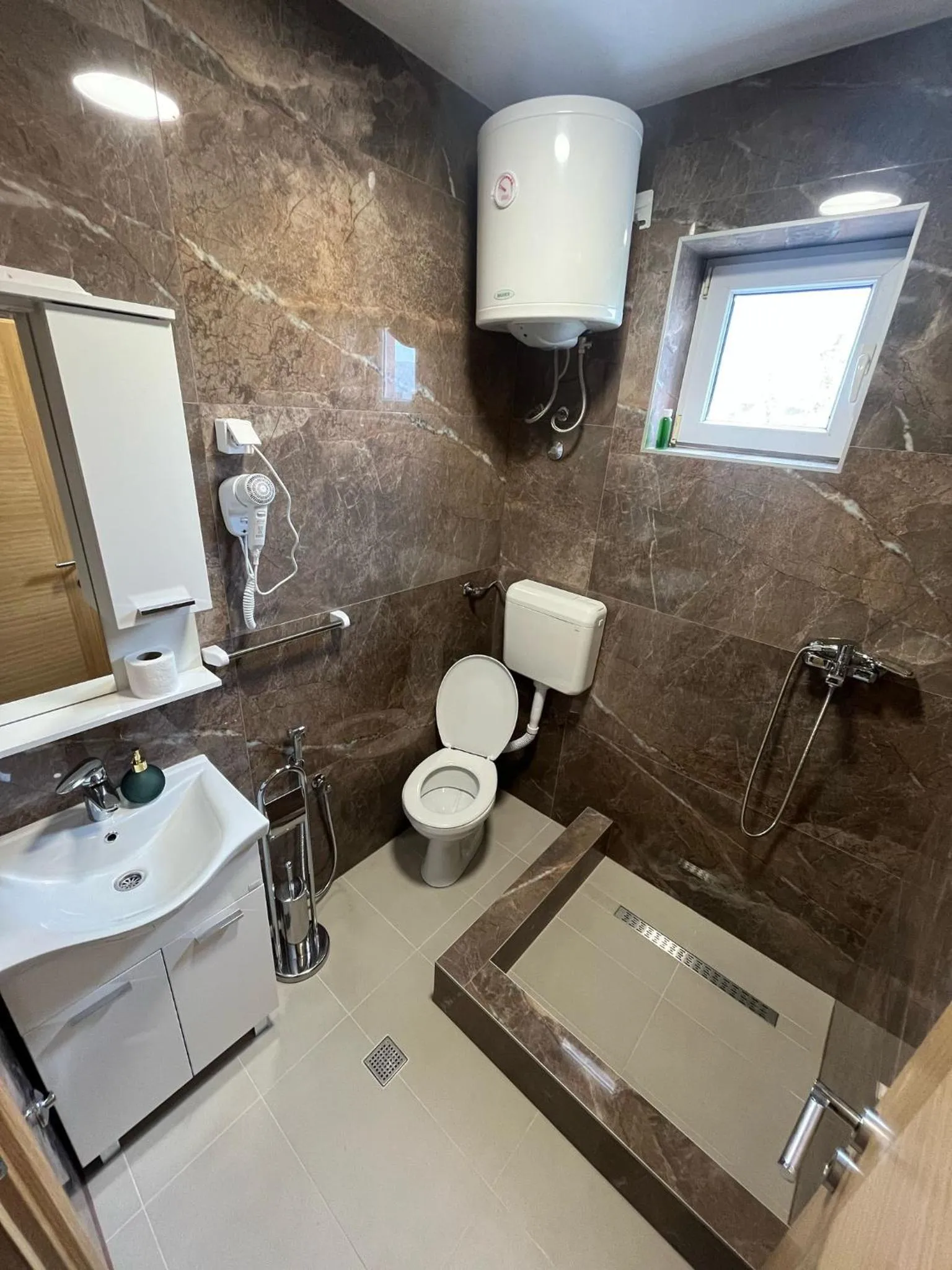 Shower in Motel Aura