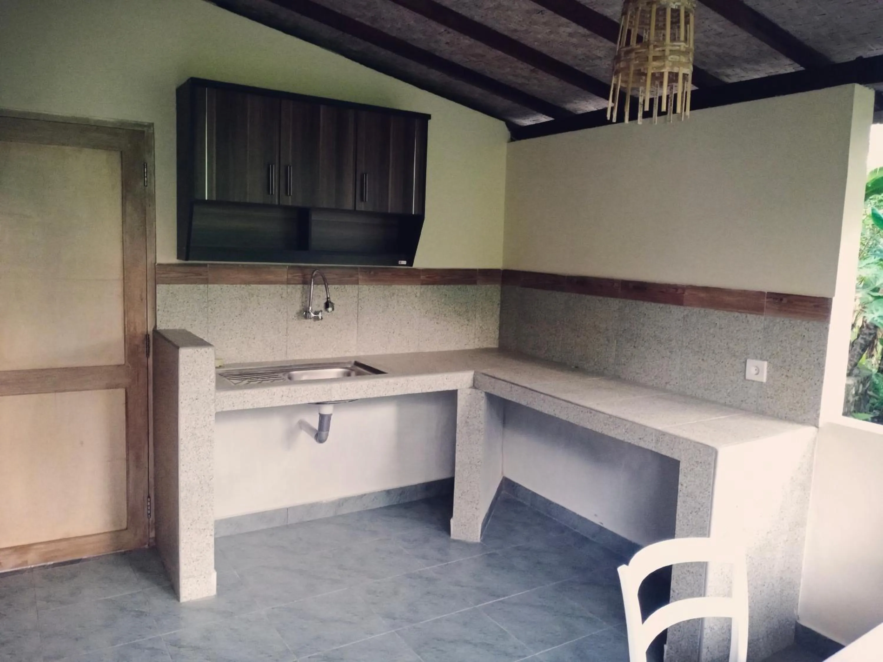 Kitchen or kitchenette in Khrisna Hs and Cottages