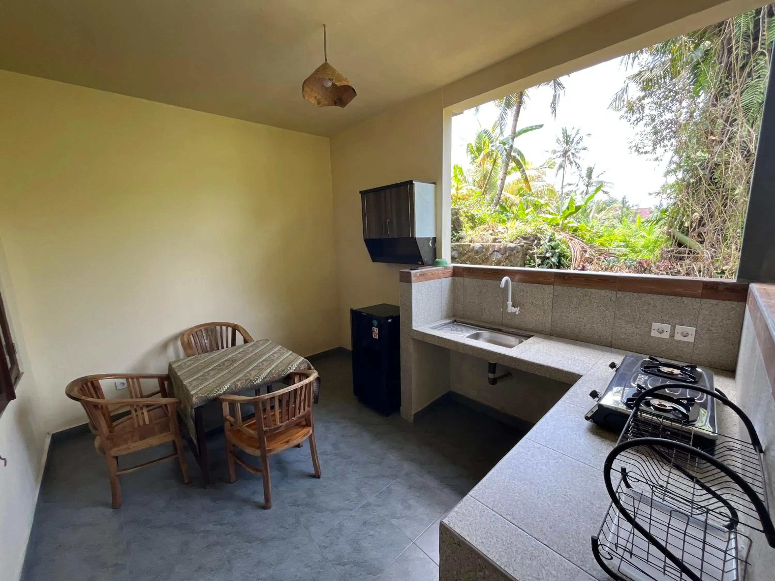 Kitchen or kitchenette in Khrisna Hs and Cottages