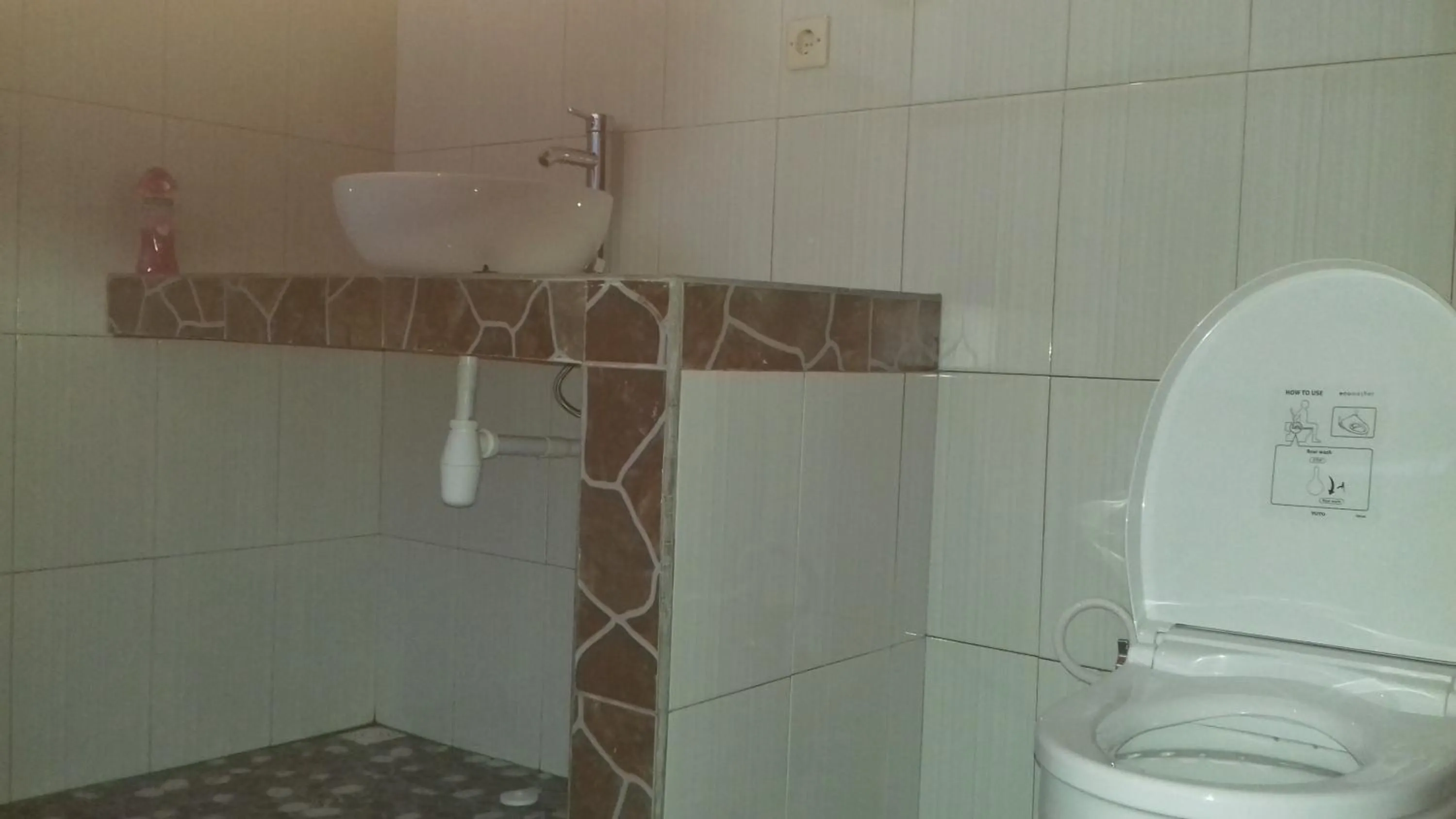 Bathroom in Khrisna Hs and Cottages