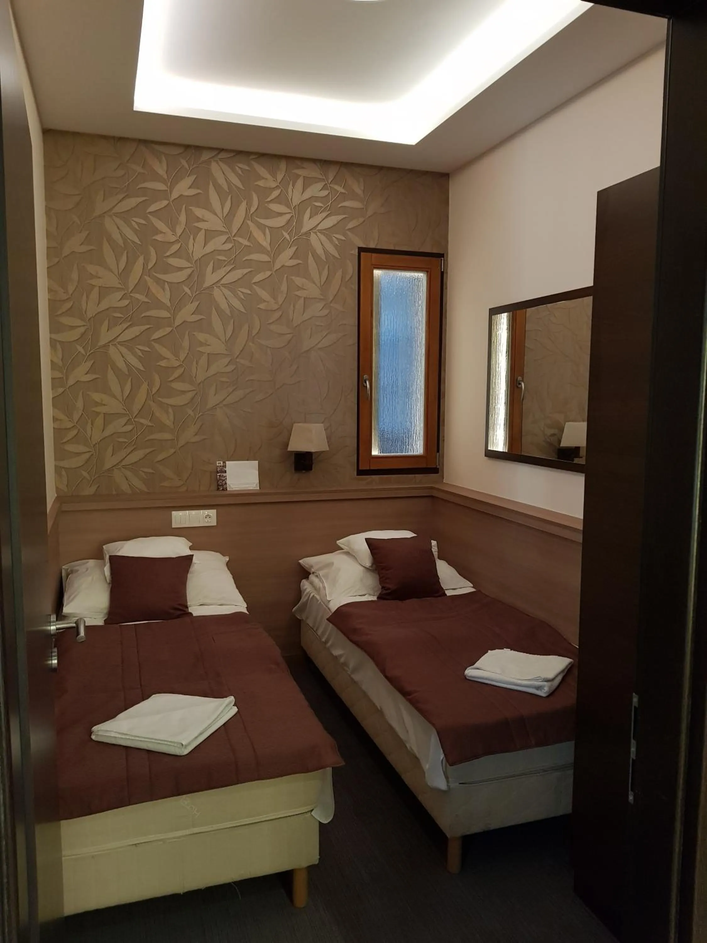 Bedroom, Bed in Central Hotel 21