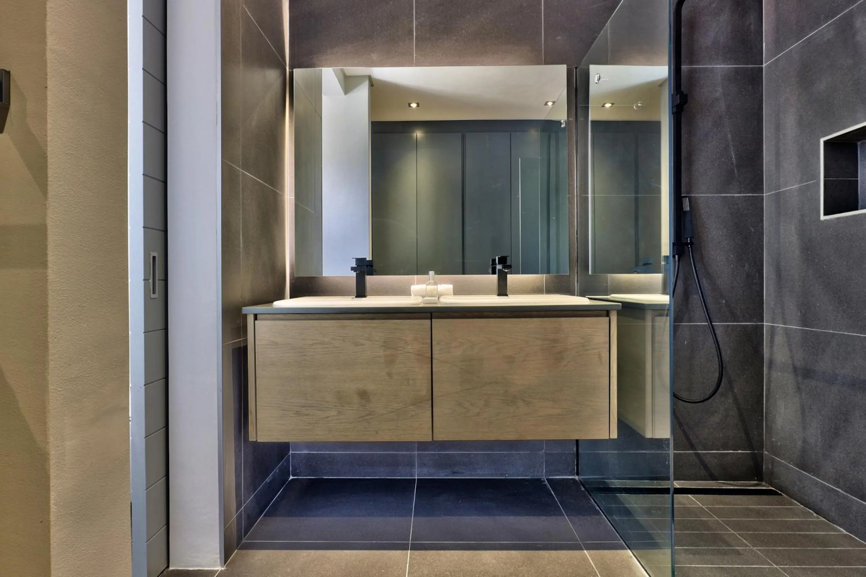 Bathroom in Elements Luxury Suites by Totalstay