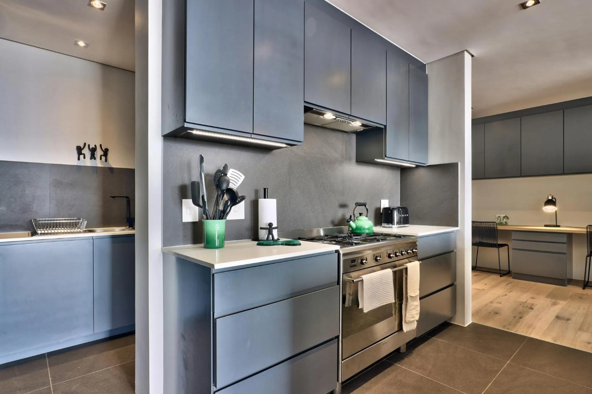kitchen in Elements Luxury Suites by Totalstay