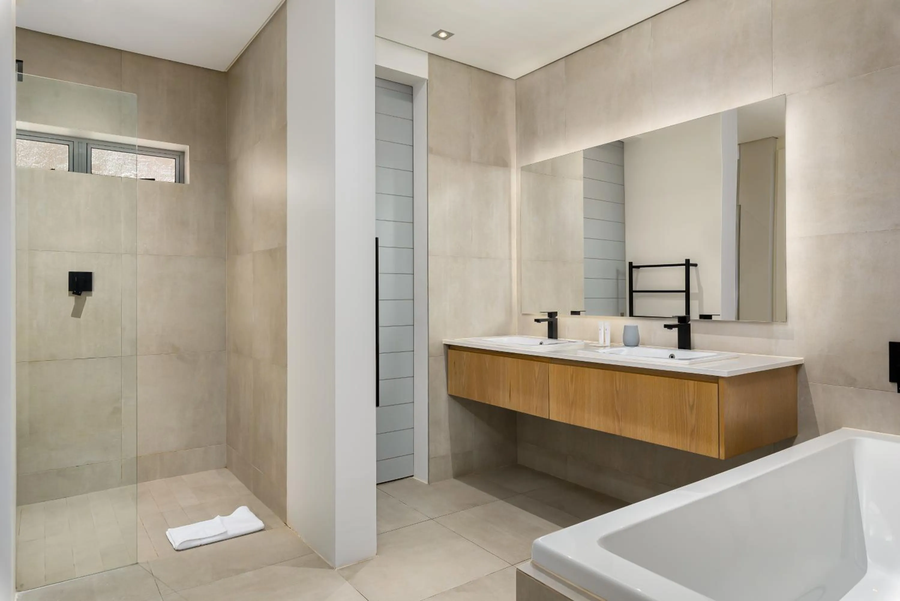 Bathroom in Elements Luxury Suites by Totalstay