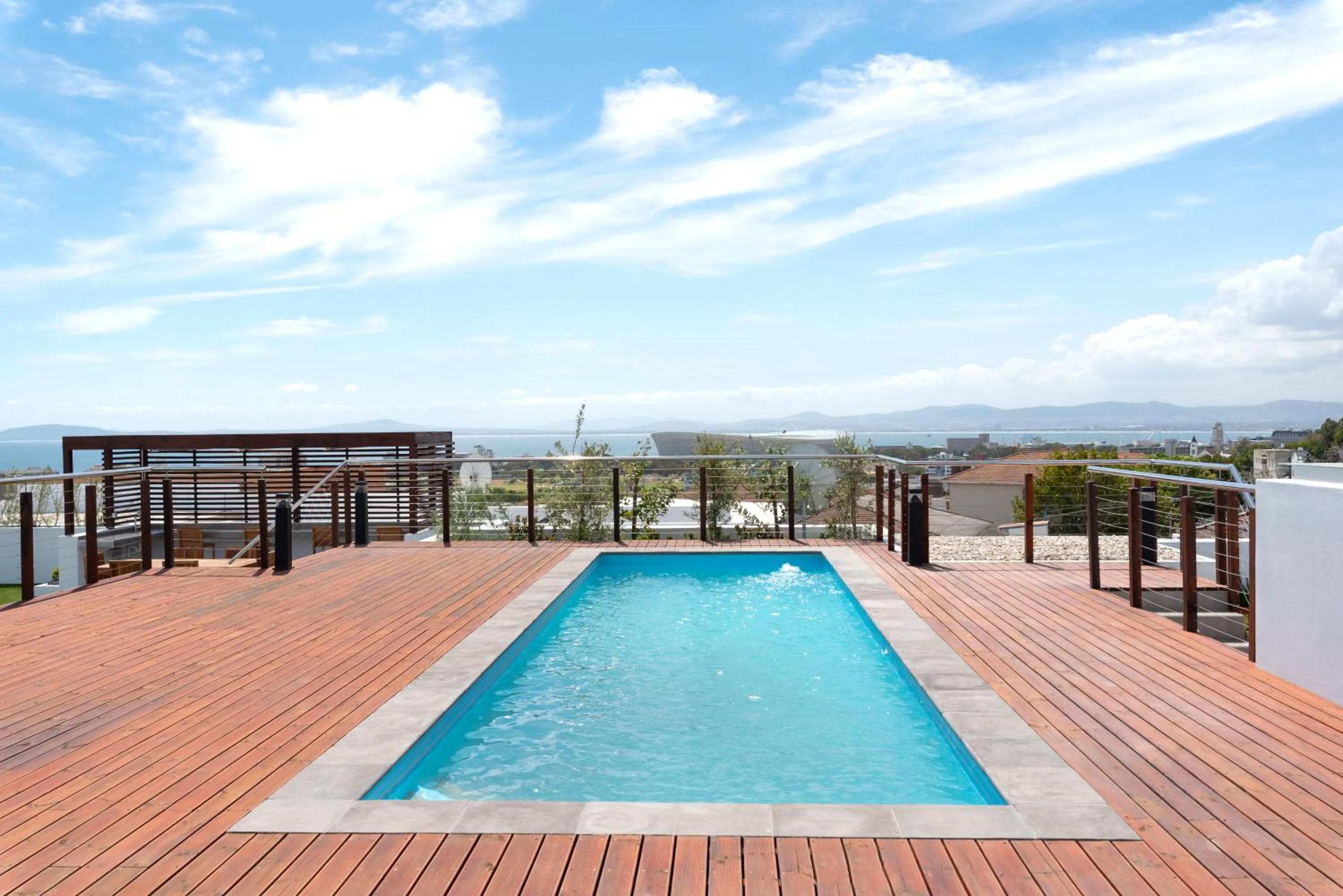 Swimming pool in Elements Luxury Suites by Totalstay